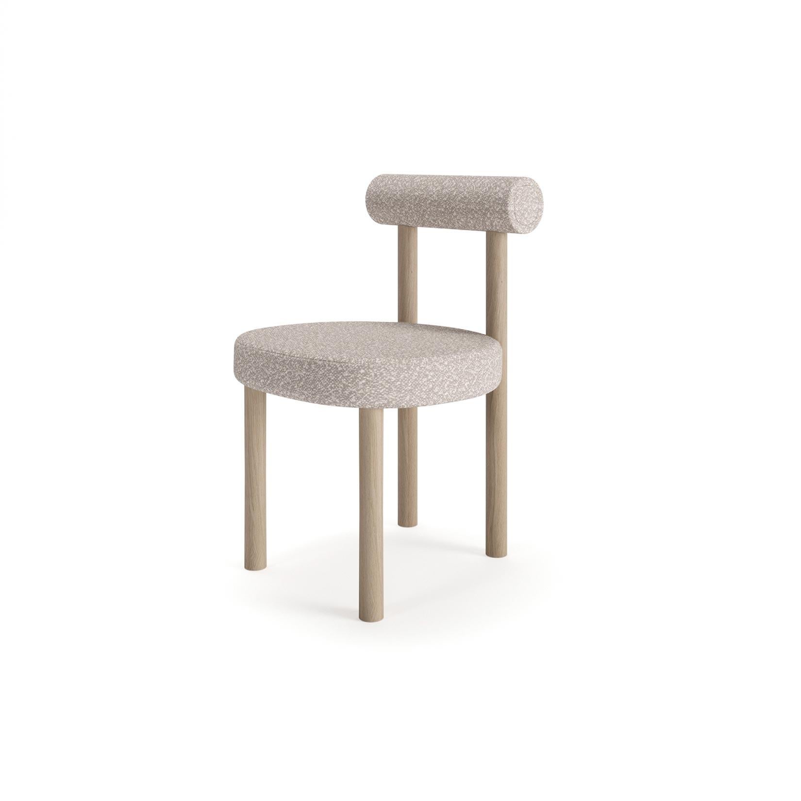 Woodland Ash and Beech Chair w/ Upholstered Seat and Back Roll - Darker Color.

Lid: 
22mm medium density fiberboard in 50mm solid oak frame

Structure: 
19mm Medium density fiberboard: girdles, lid, bottom
6mm Medium density fiberboard: