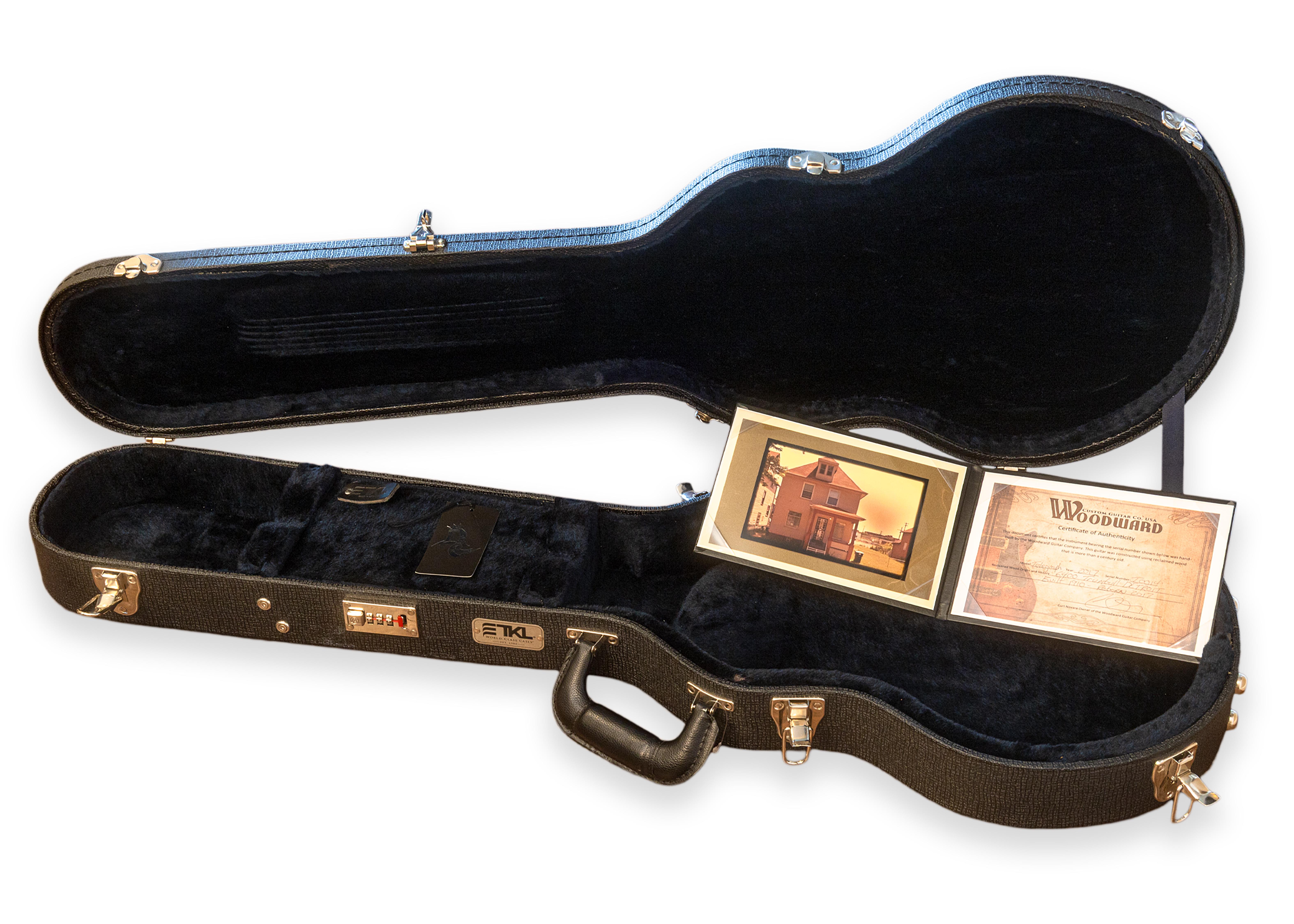 A rare guitar originally crafted in 2017 by Curt Novato from the Woodward Custom Guitar Co., a boutique Detroit-based maker renowned for its attention to detail and old-world craftsmanship. Meticulously built from reclaimed wood sourced from Reclaim
