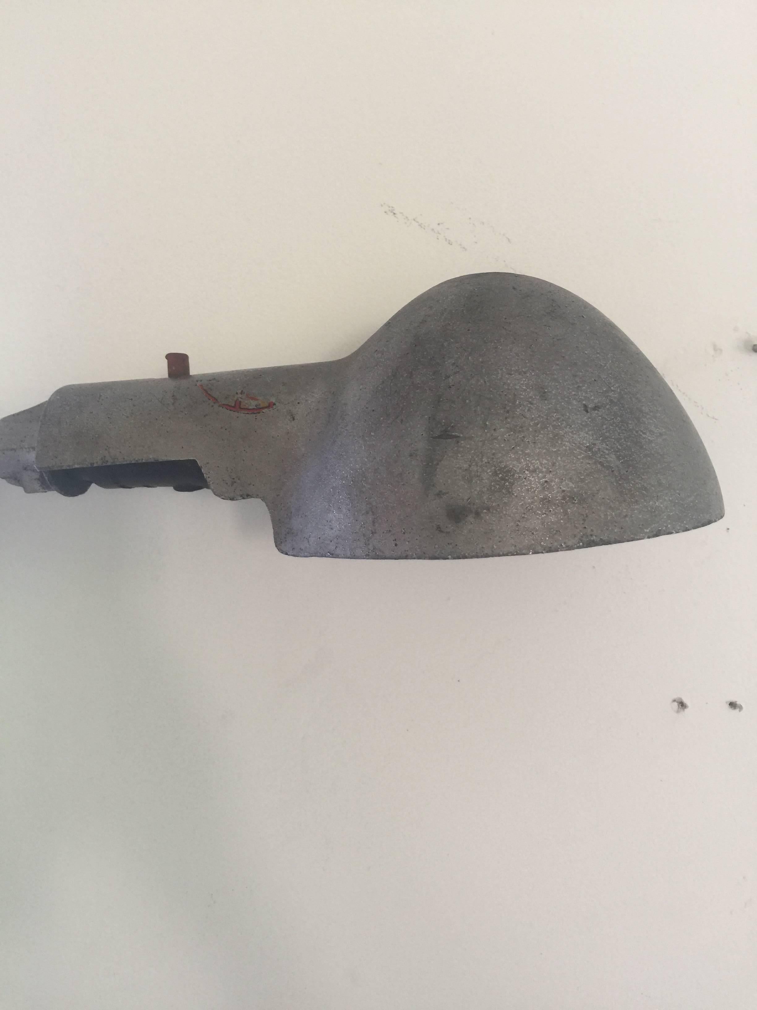 An all-original early 20th century metal wall lamp by Woodward Lighting Company, Detroit. 

Stamped with maker's mark on wall mount. 

Adjustable arm and shade. 

Fully working; takes standard U.S. bulb.

Dimensions: 28 inch size H x 15.5 inches W x