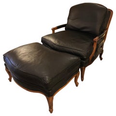 Woodward & Lothrop Top of the Line Black Leather and Walnut Club Chair & Ottoman