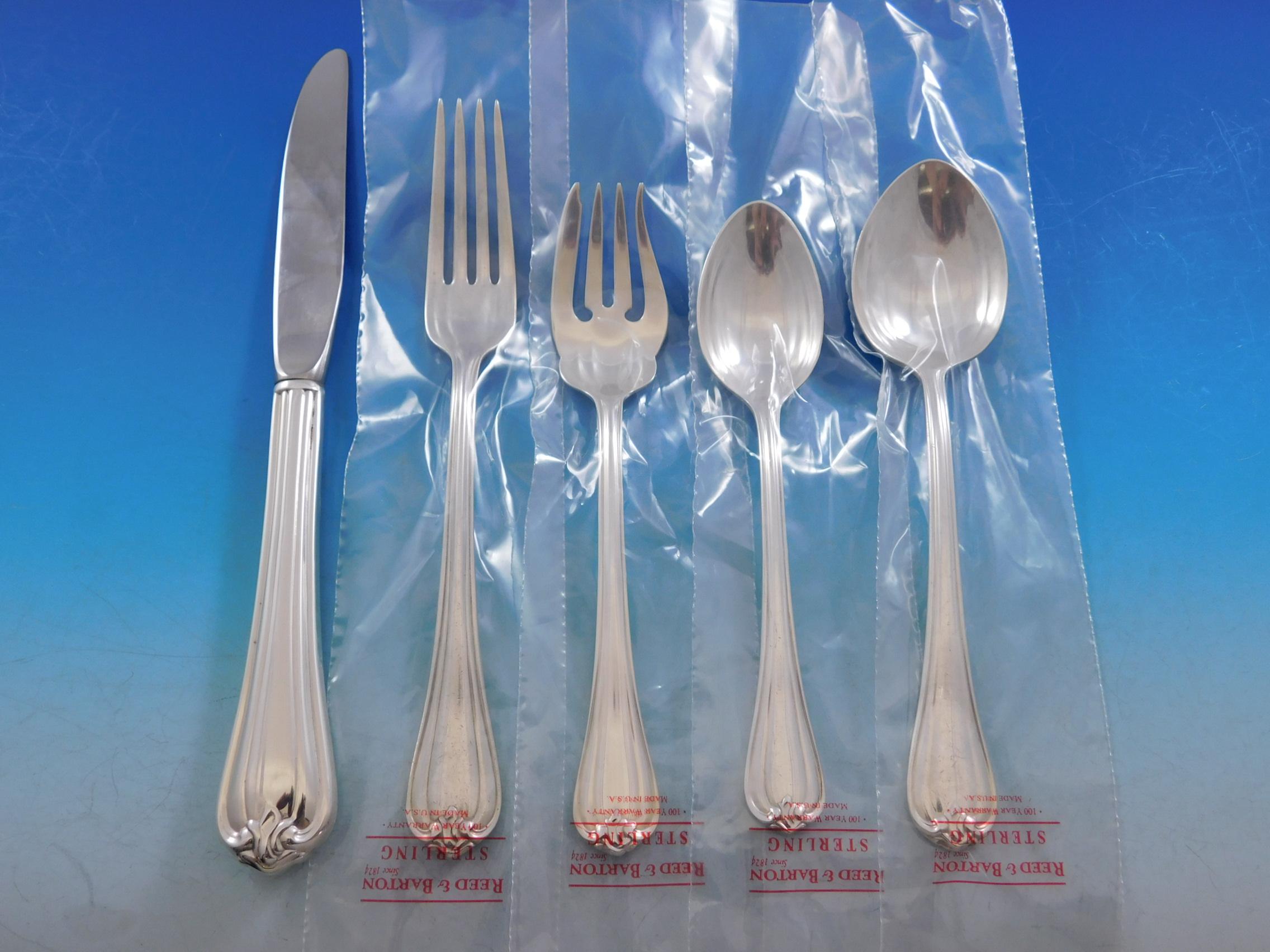 Woodwind by Reed & Barton service de couverts en argent sterling - 44 pièces. Cet ensemble comprend :

8 couteaux, 9