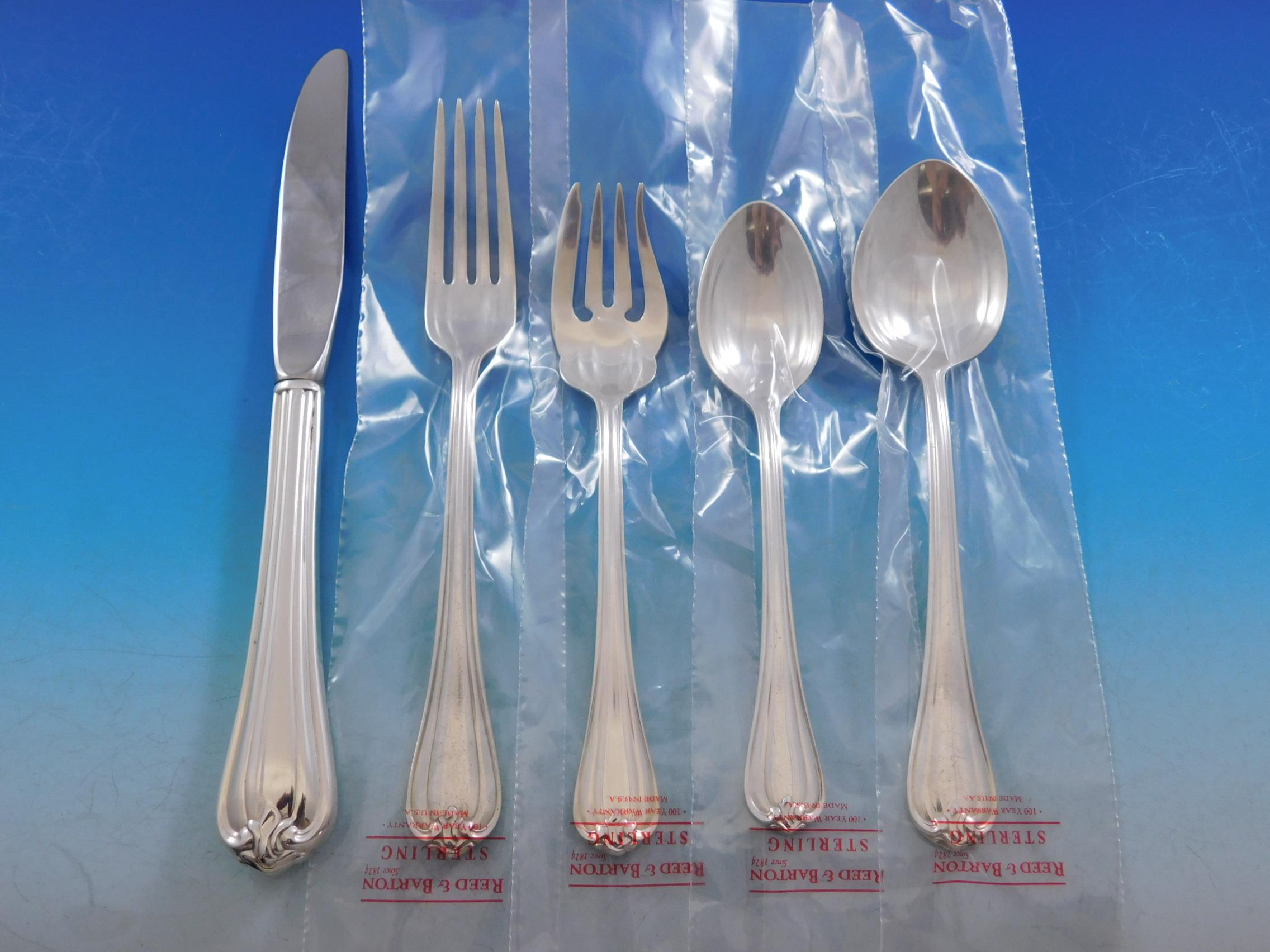 Woodwind by Reed & Barton sterling silver flatware set - 44 pieces. This set includes:

8 knives, 9