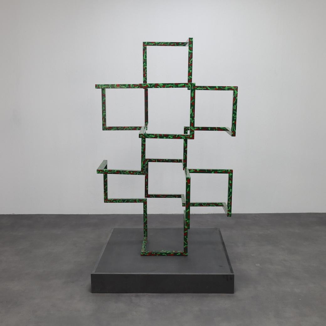 A striking geometric piece by Dutch artist Woody van Amen, blending rhythm, structure, and visual energy. Taxat is composed of sharply angled, grid-like lines arranged in a spatial composition — both sculptural and architectural. The hand-painted