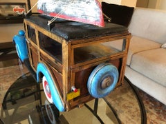 "Carrozza di legno con canoa" di Paul Jacobsen