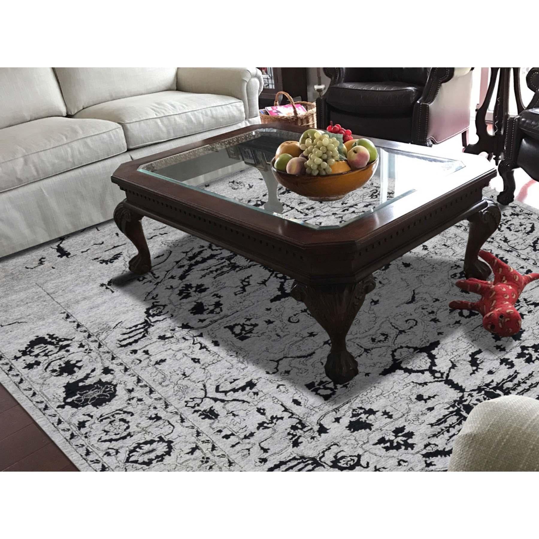 This is a truly genuine one-of-a-kind wool and silk broken Persian Heriz design hand knotted Oriental rug. It has been knotted for months and months in the centuries-old Persian weaving craftsmanship techniques by expert artisans. Measures: 8'1