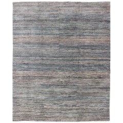 Used  Fine Modern Rug in Solid design with Variegated Blue, brown, Tan, Taupe & Gray