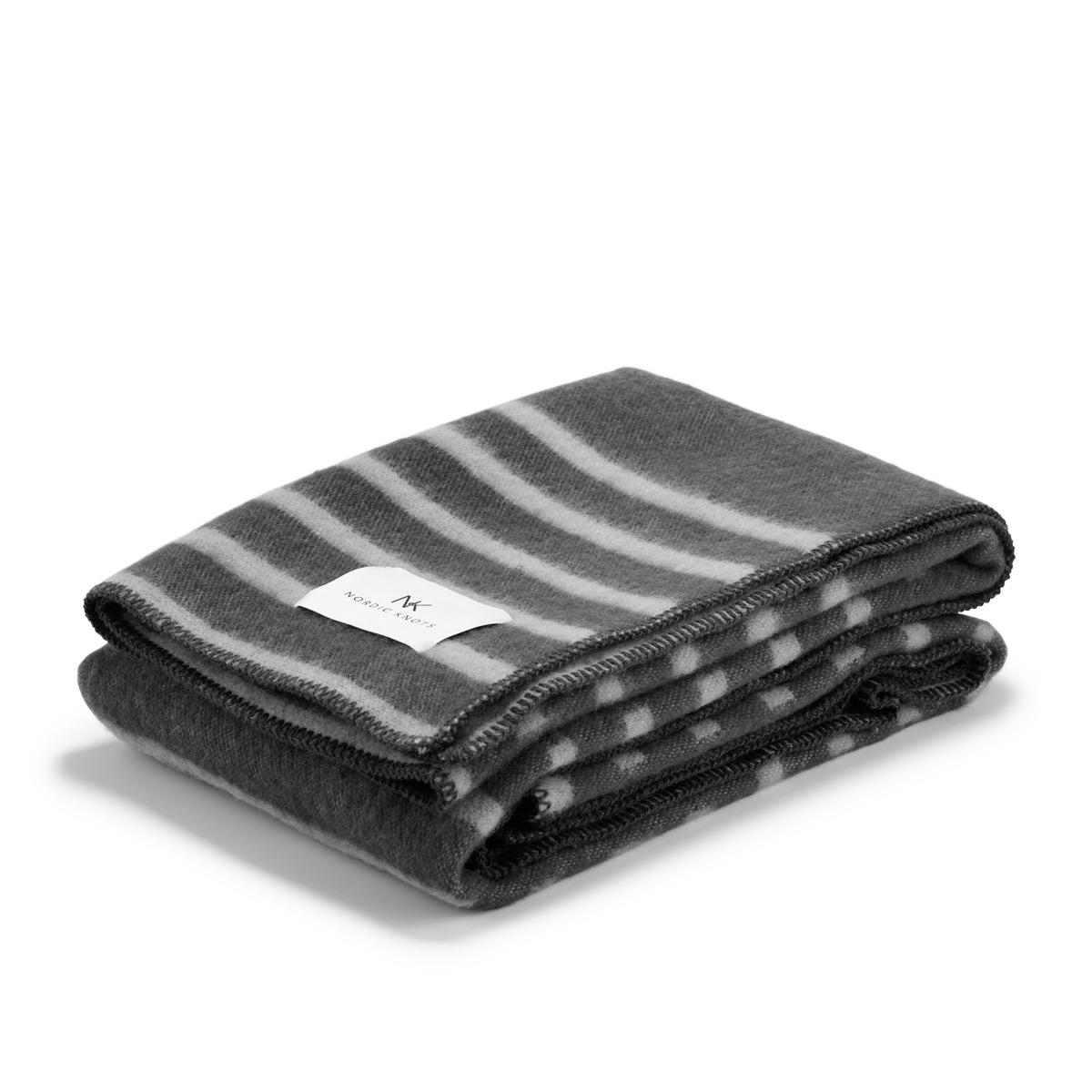 A traditional design inspired by classic Scandinavian patterns. It will look as stunning both in full and when folded or thrown over your furniture. The blanket is woven to be as beautiful on the back as the front but with inverted colors on each