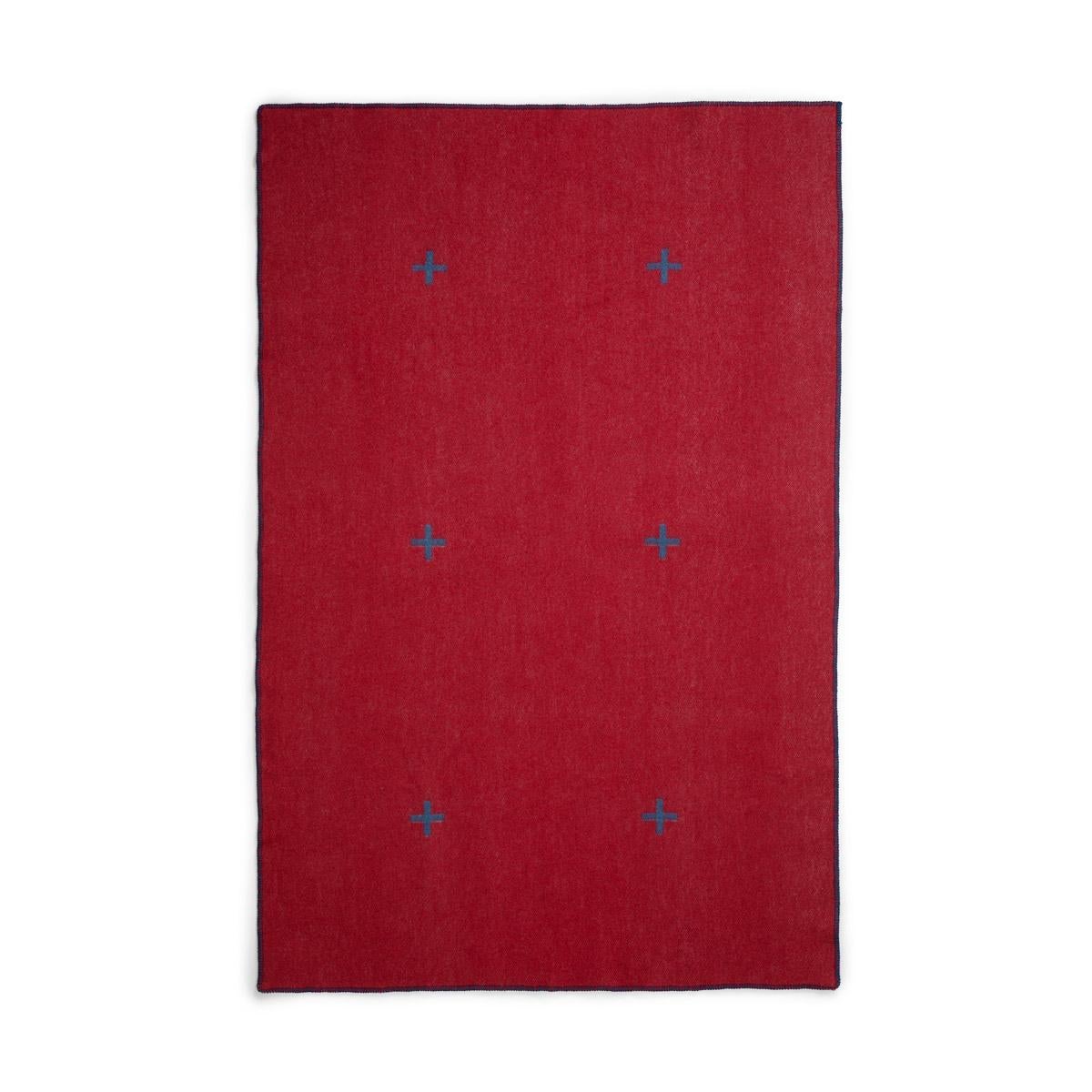 Our plus design is strikingly simple. A Minimalist Scandinavian design in classic blue and red colors. The blanket is woven to be as beautiful on the back as the front but with inverted colors on each side.