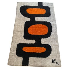 Tapis en laine à décor géométrique avec monogramme AP, 1974