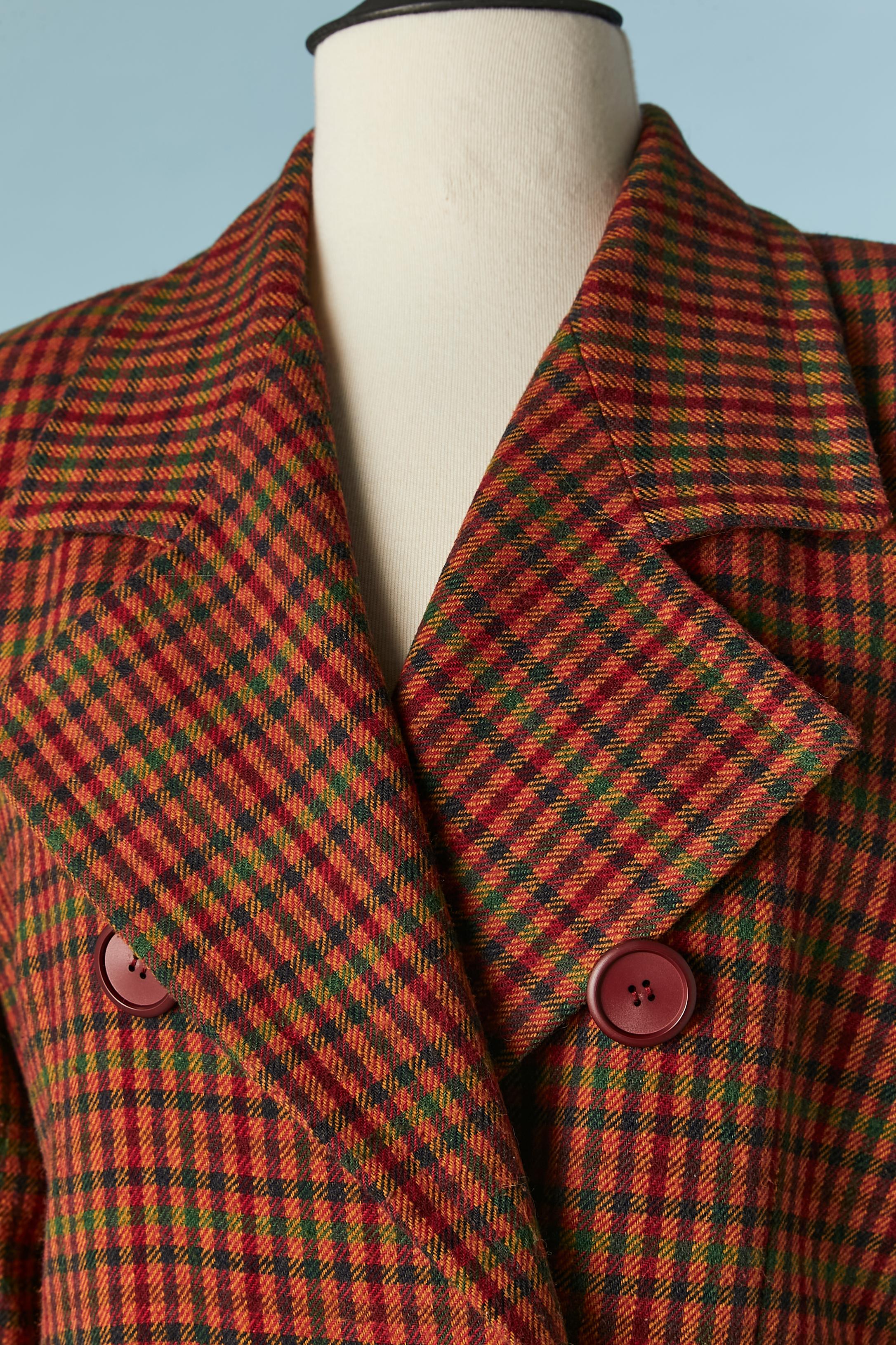 Wool check skirt-suit with double-breasted jacket. Shoulder-pads
SIZE 42 (Fr) L 