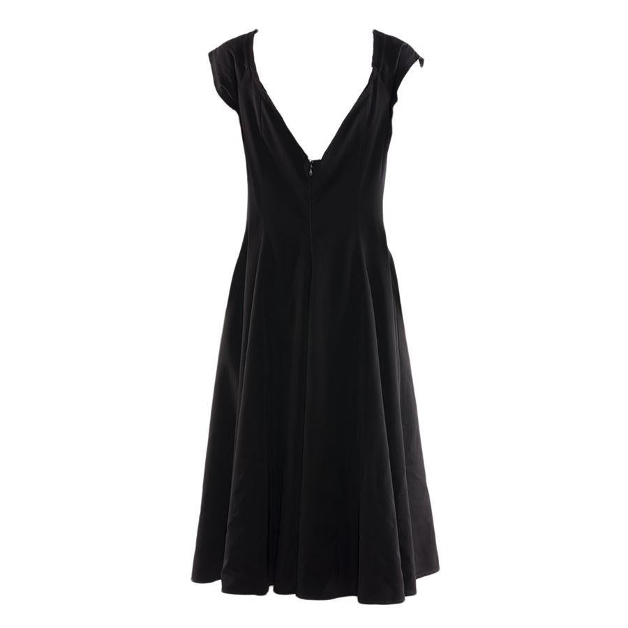 Wool Black color Sleeveless Live cut profile Total lenght shoulder/hem 118 cm (46.5 inches) Original price euro 1400
