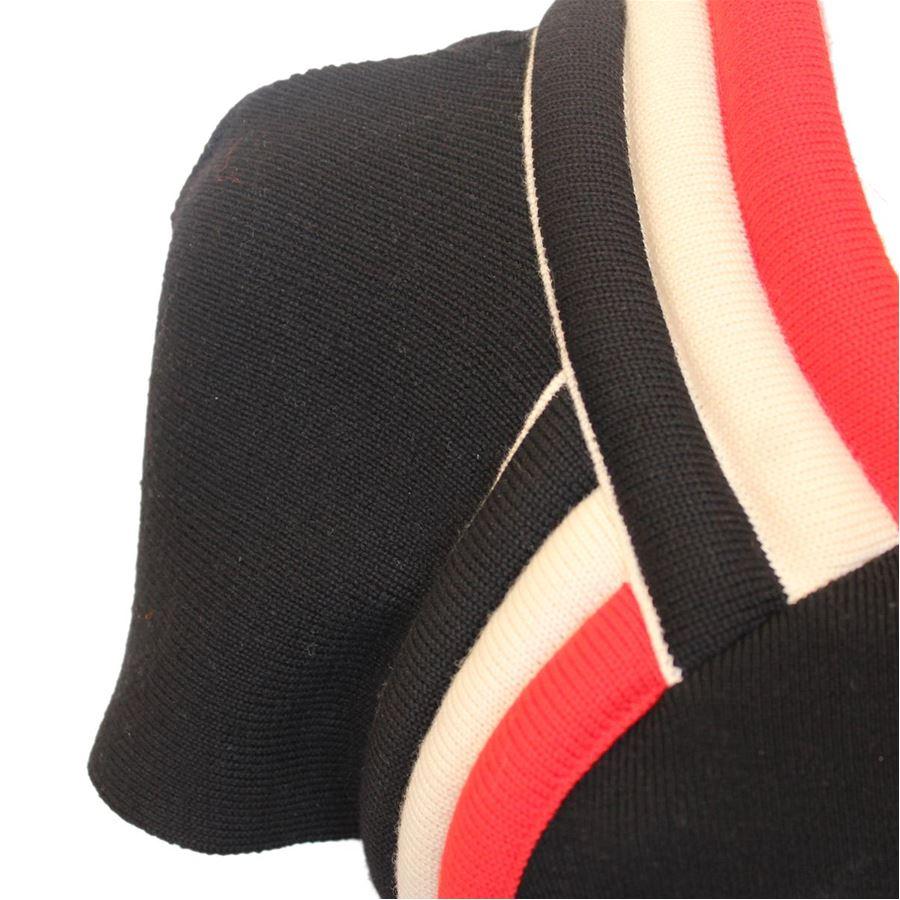Wool Black color Red and white stripes Short sleeve Total lenght (shoulder/hem) cm 90 (35.4 inches) Shoulder cm 44 (17.3 inches) French size 38 italian 42
