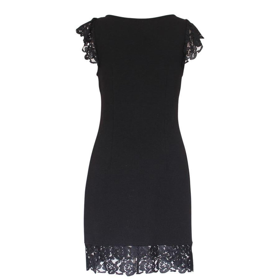 Wool (100%) Black color Lace insert on shoulders and bottom Total length cm 86 (33.8 inches) Shoulder width cm 31 (12.2 inches)
