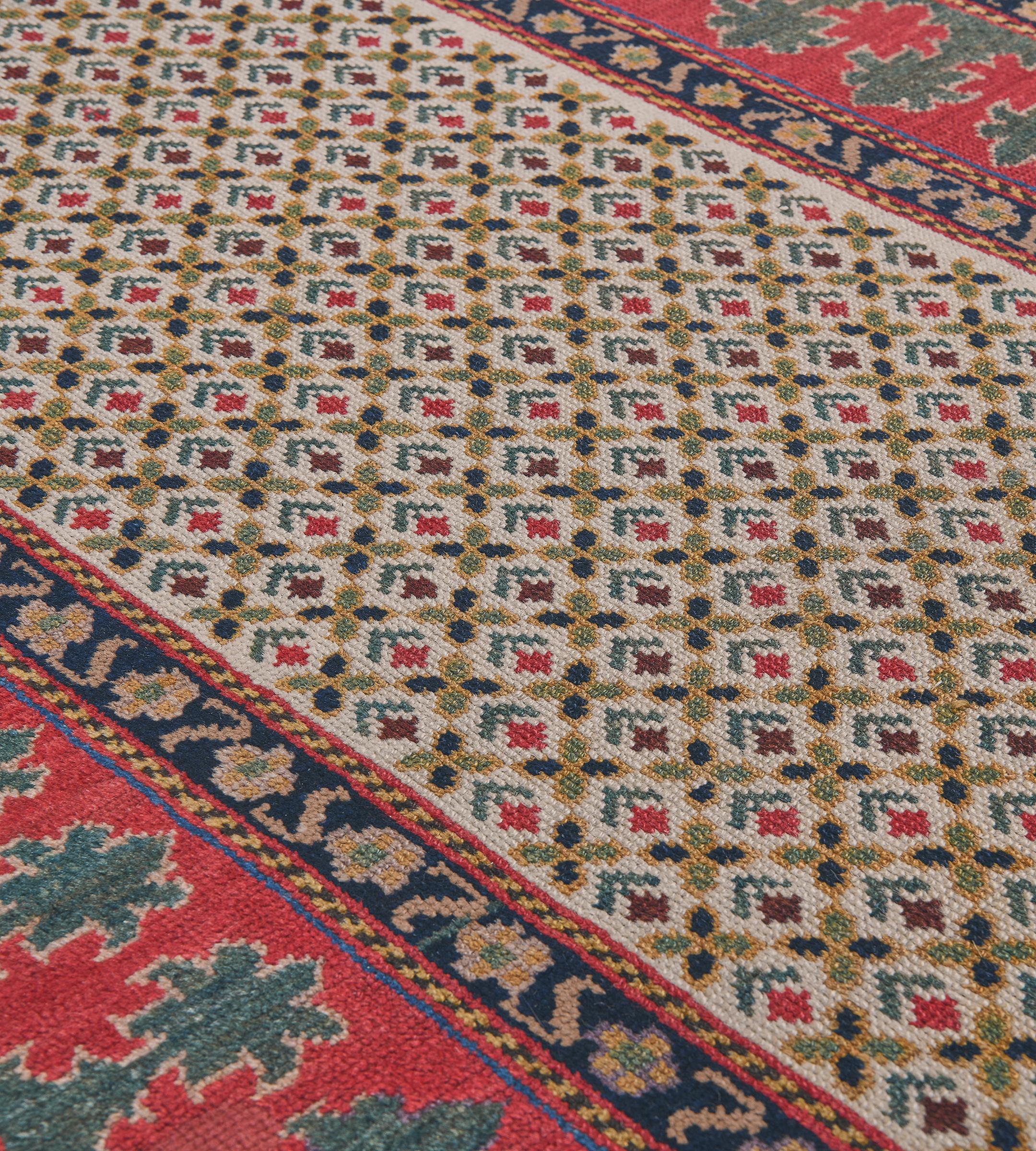 Hand-Knotted Wool Floral Antique Caucasian Runner with Bold Border For Sale
