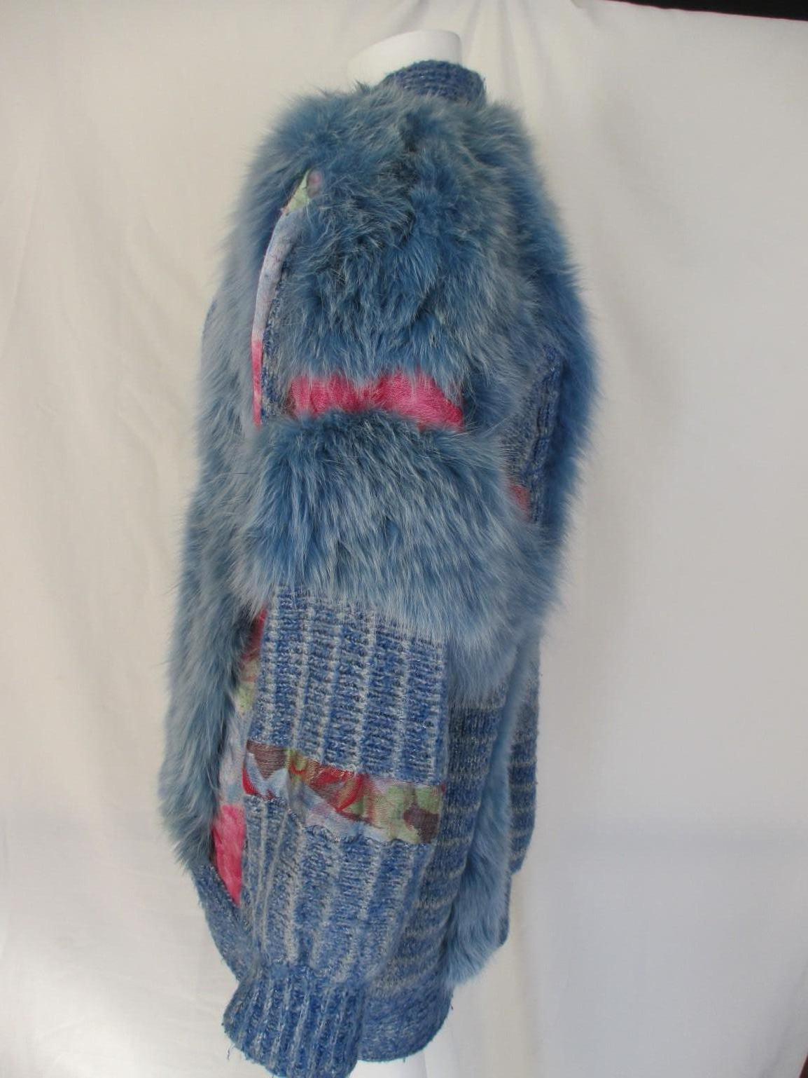 Fabulous original vintage 80/90s blue wool coat 

we offer more exclusive item, view our frontstore
Details:
embroidered with appliqués and blue dyed fox fur with 1 button closure and 2 pockets.
Fair pre-owned vintage condition with some wear at