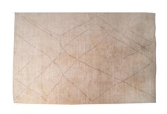 Geometrischer cremefarbener Wollteppich