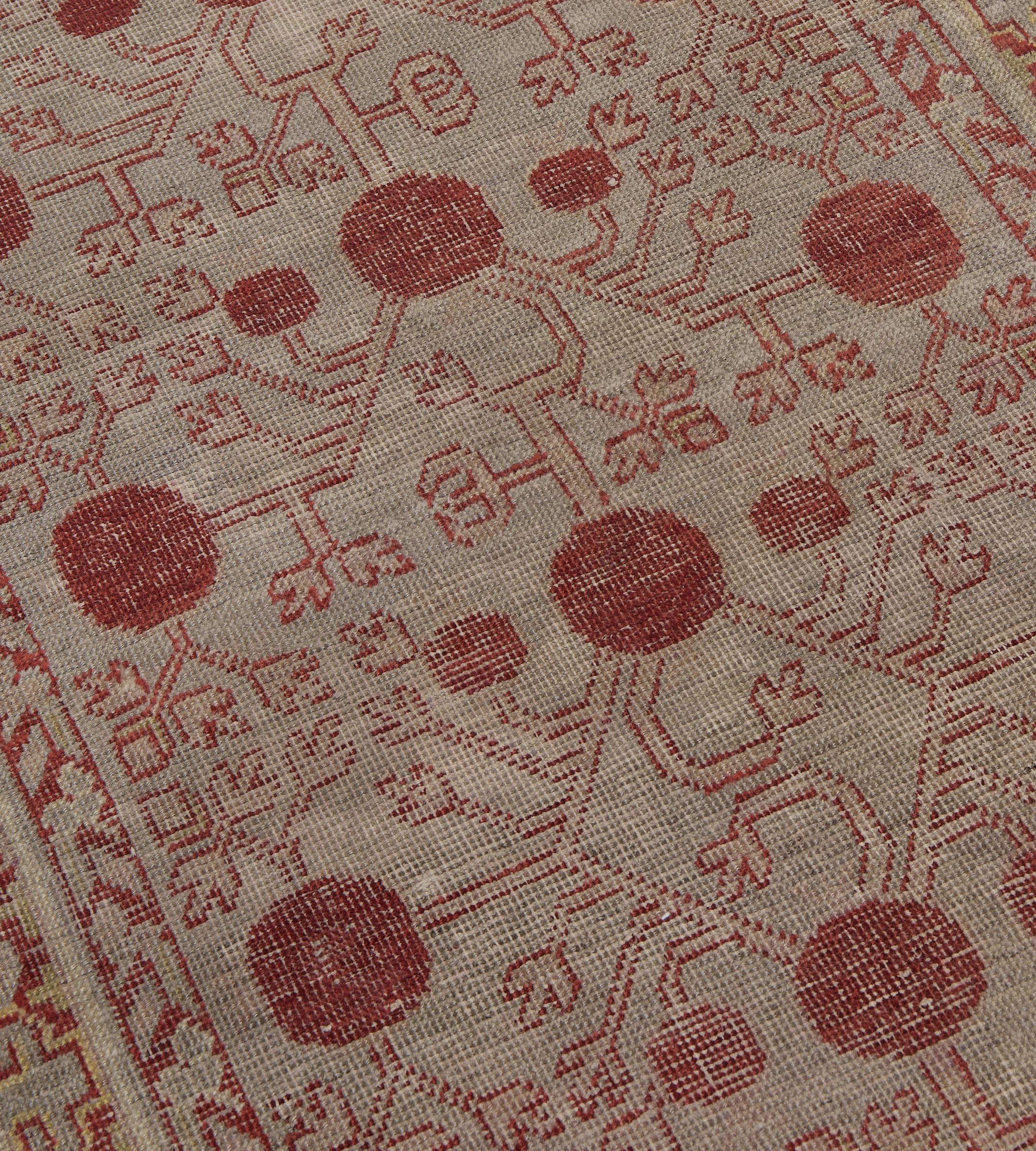 20th Century Wool Hand-Woven Antique Coral-Red Pomegranate Khotan Rug For Sale