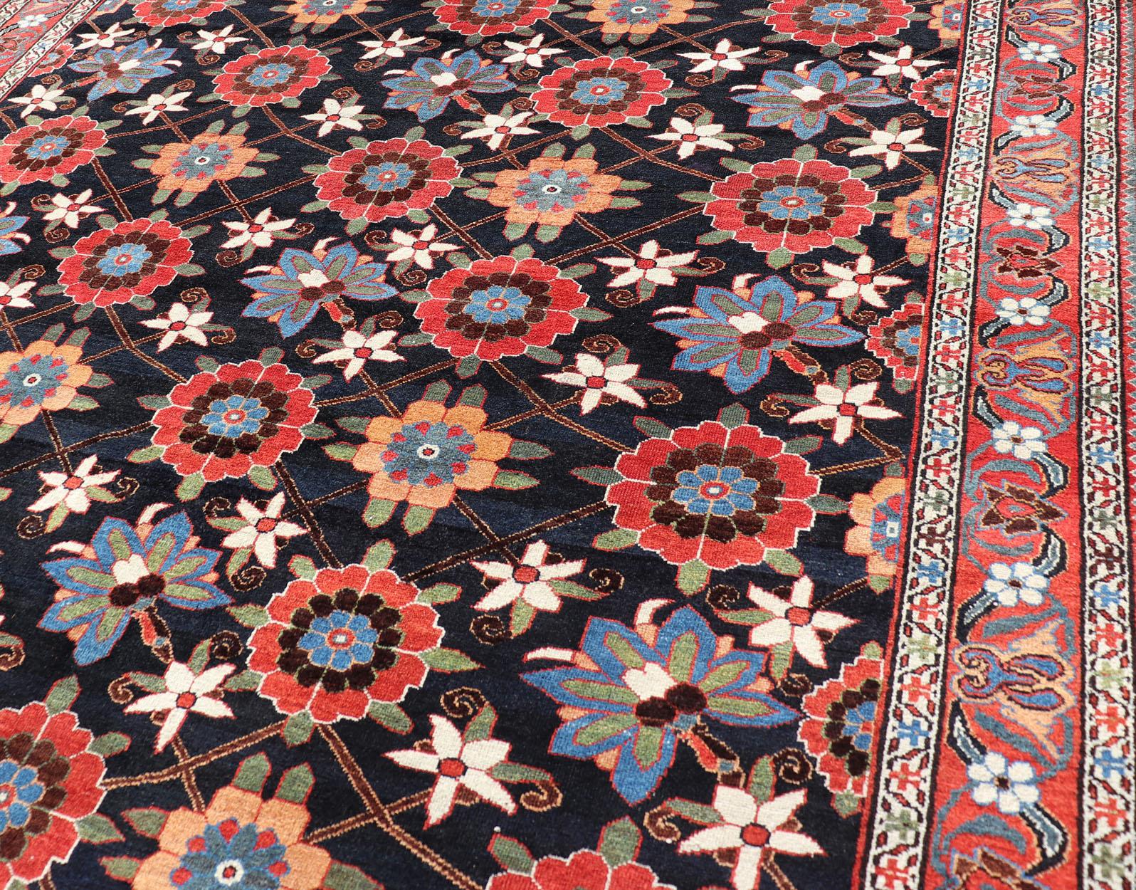 Antique Bakhtiari rug in All-Over flower design hand knotted wool gallery rug in multi colors. Keivan Woven Arts / rug EMB-9581-P13887, origin / type: Iran / Bakhtiari, circa 1920


Measures:7'6 x 13'6.