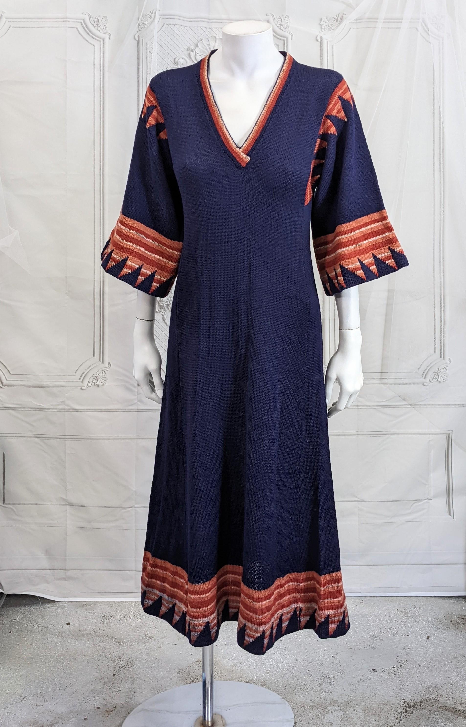 Charming Wool blend A Line long navy knit 1970's Dress, by Ulla Heathcoat, UK. Long paneled dress in navy wool blend knit with contrast bands at kimono sleeves and hem. 
Bust 30