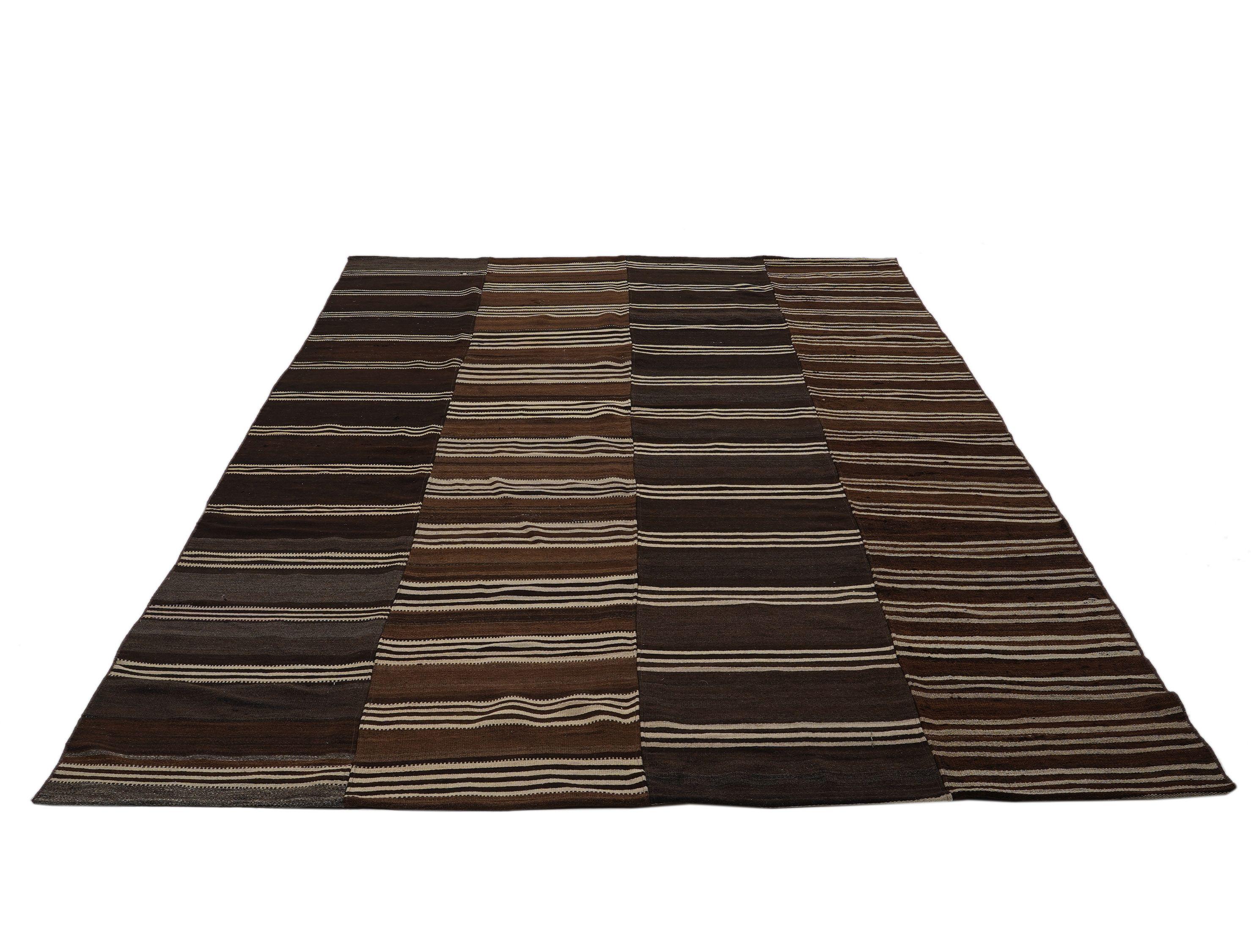Handmade by skilled weavers in Turkey, this panel stripe rug in rich earthy brown tones is both timeless and contemporary. 

Our Turkish rugs are made using ancient art forms passed down through generations. Skilled artisans use traditional