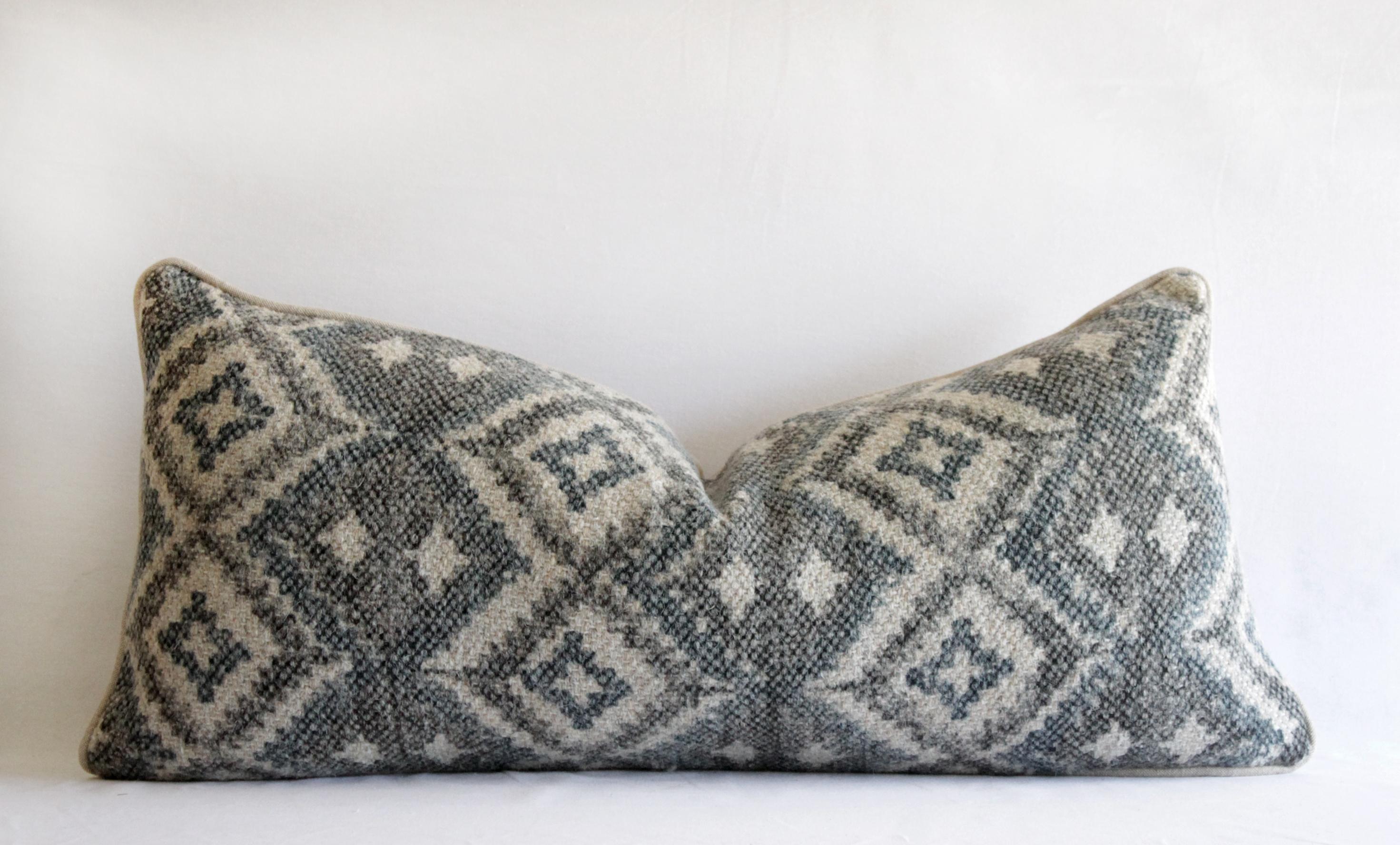 Beautiful wool lumbar pillows in a dark charcoal color, with natural and hints of indigo blue. These are new pillows made with a hidden zipper closure back, and piped edge. Insert is not included, but one can be provided for an additional