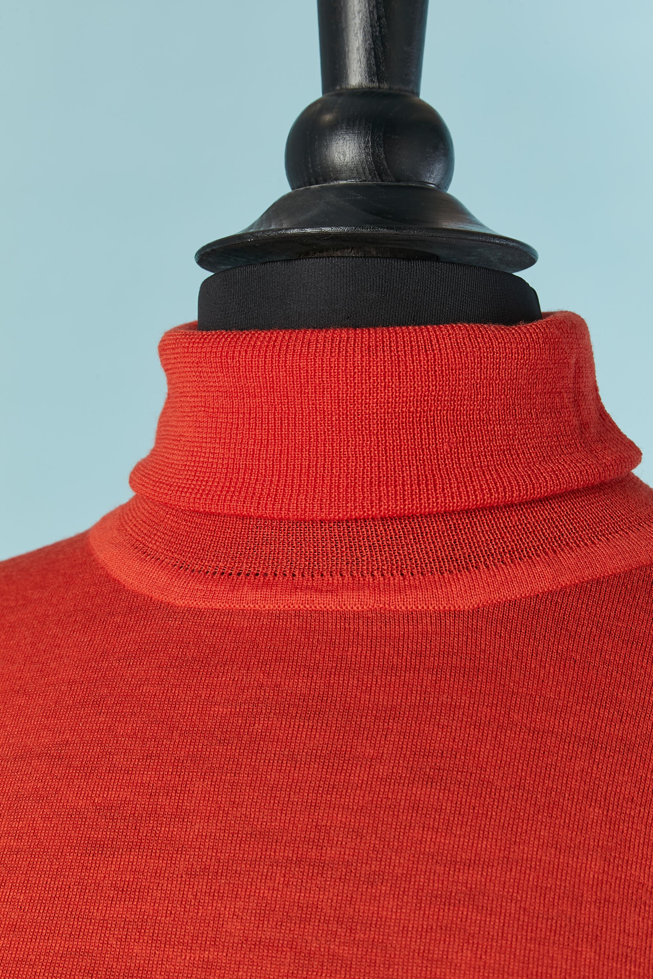 Wool orange turtle neck sweater and black on the bottom back.
SIZE S 