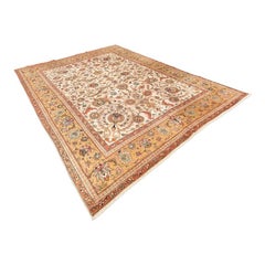 Wool rug. Classic Tabriz design with yellows and golds. 3.75 x 2.90m