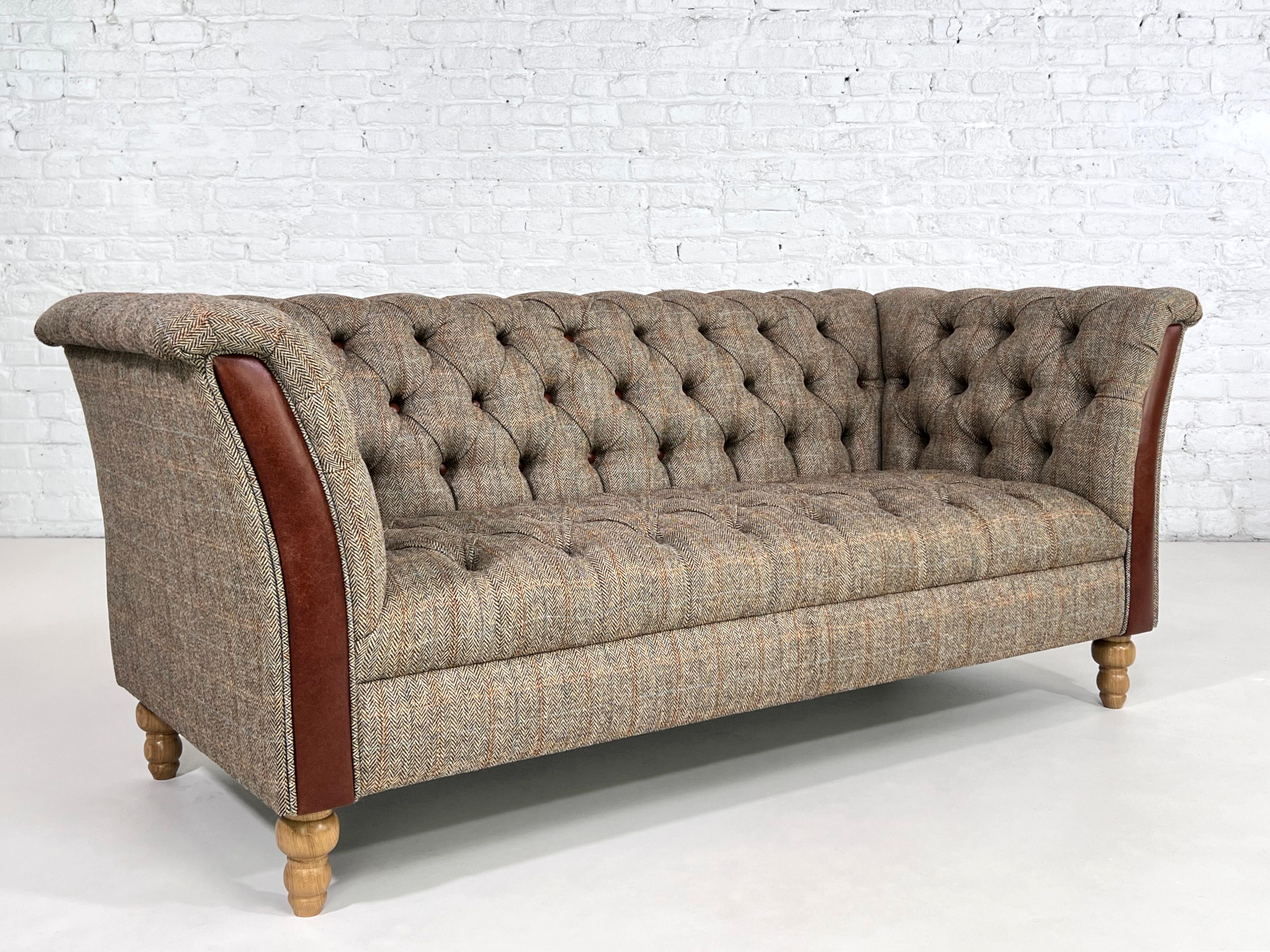 Wool Tweet Fabric WIth Leather Padded Button Finishes And Wood Chesterfield Sofa.