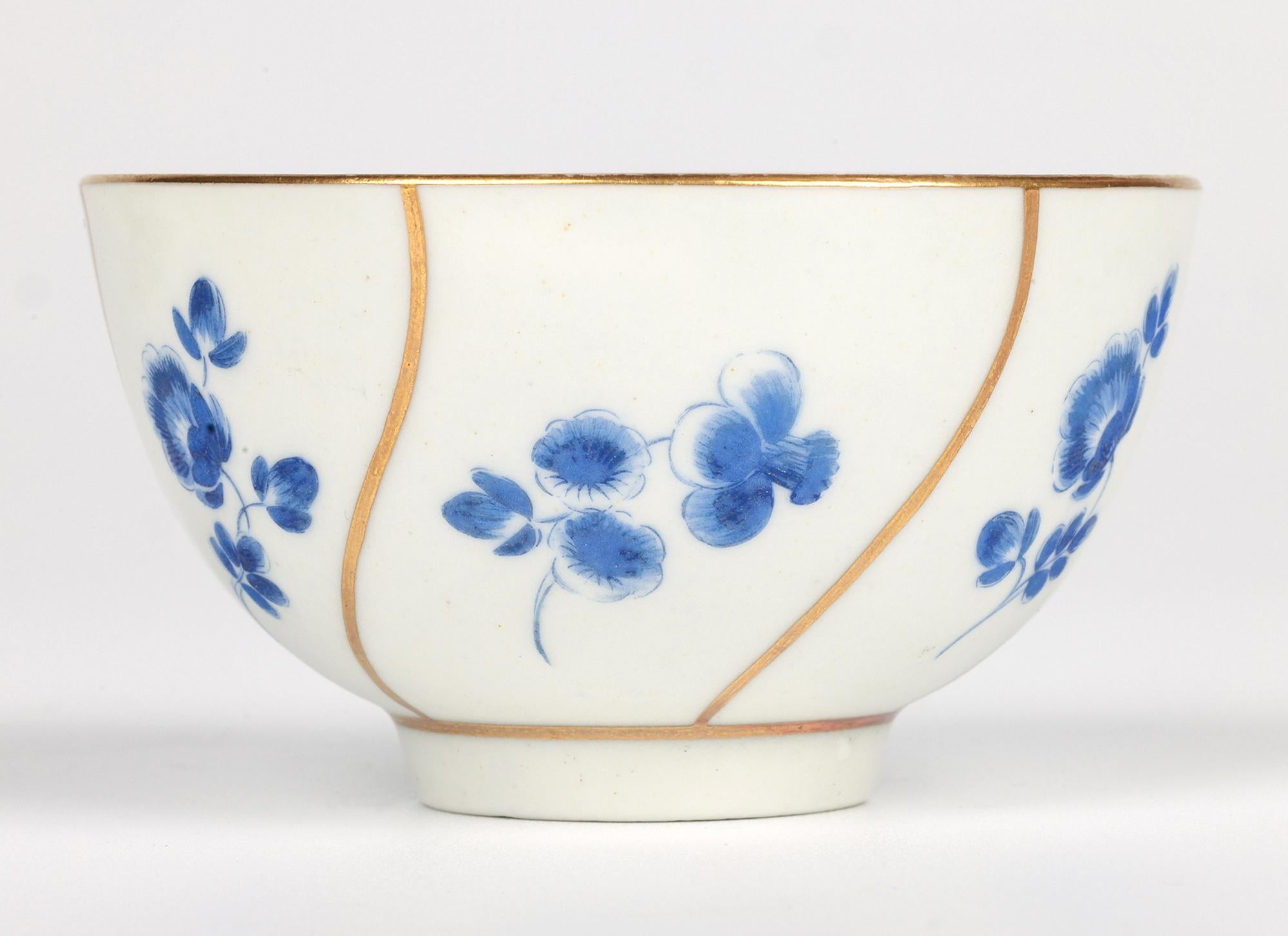 A fine and scarce early English porcelain tea bowl and saucer painted with dry blue floral patterning by acclaimed makers Worcester and dating to the Dr Wall period 1770 – 75. The teabowl is of simple rounded form standing raised on a narrow round