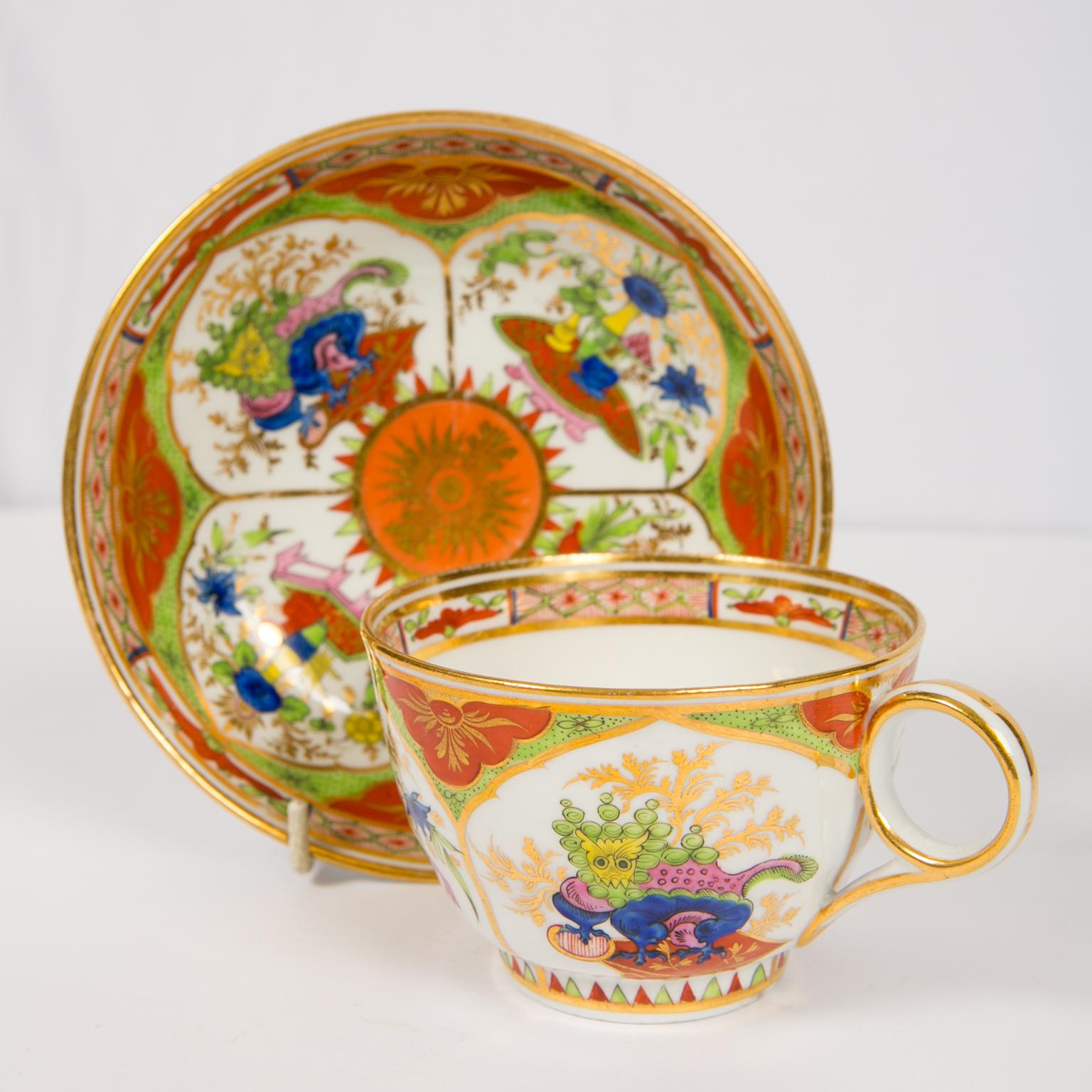 A set of three (the image shows four cups, one was sold) Chamberlain Worcester Dragon in compartments generous size, eight ounce tea cups and saucers. They are painted with mythical beasts alternating with vases all within lappet-shaped panels.
This