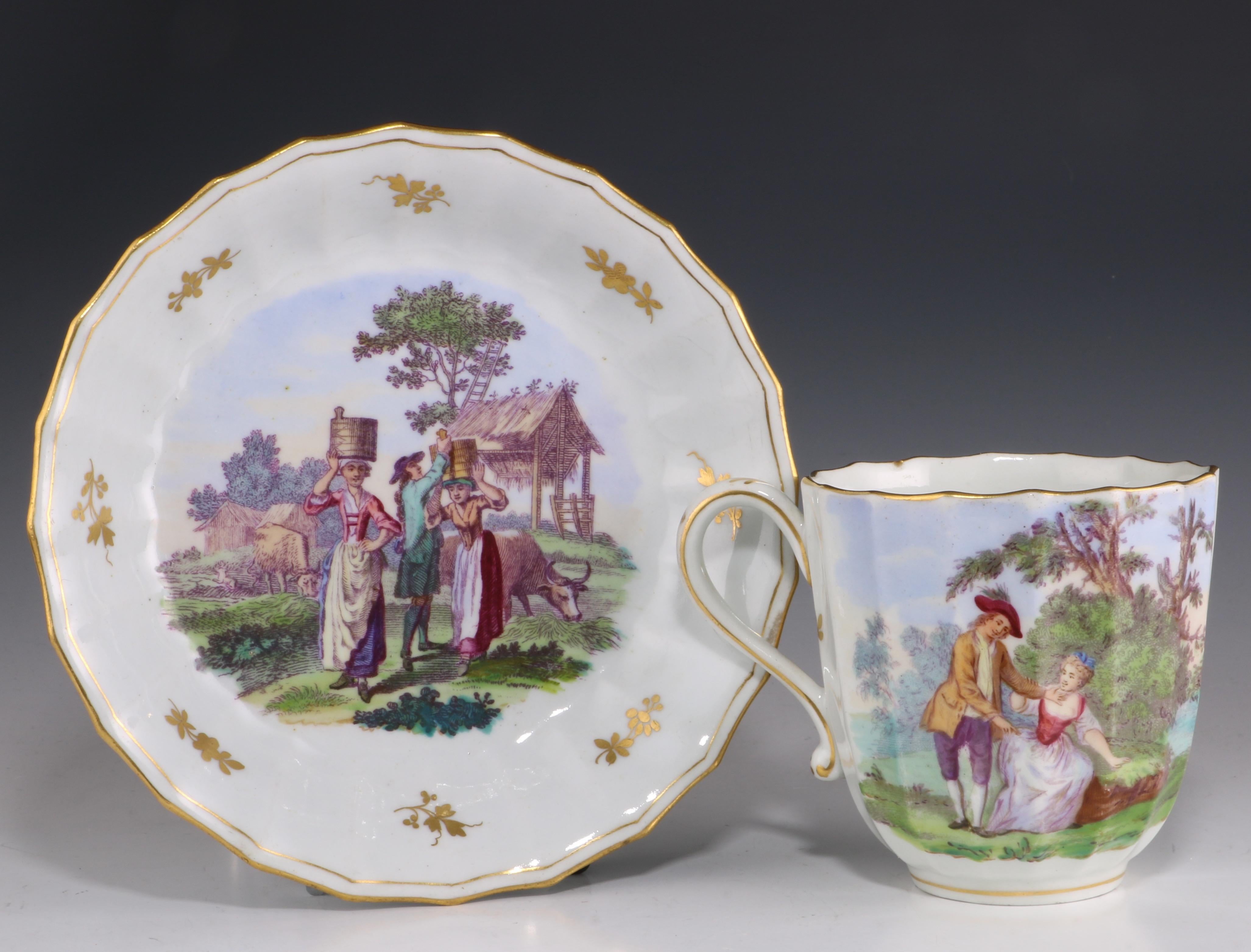 Worcester cup and saucer. The saucer with an over decorated over glaze print 'The Milkmaids' and the cup with 'The Tease' and 'The Milkmaids' similarly over decorated.

circa 1770.