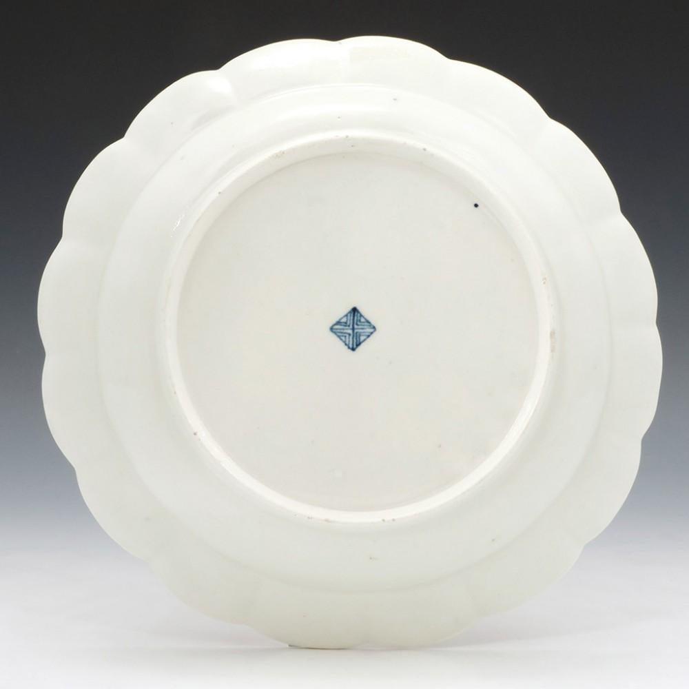 Worcester Porcelain Blue Scale Junket Dish, c1770

Additional information:
Date : c1770
Period : George III
Marks :Square seal mark
Origin : Worcester, England 
Colour : Polychrome
Pattern : Blue scale with cartouches containing floral spirgs,