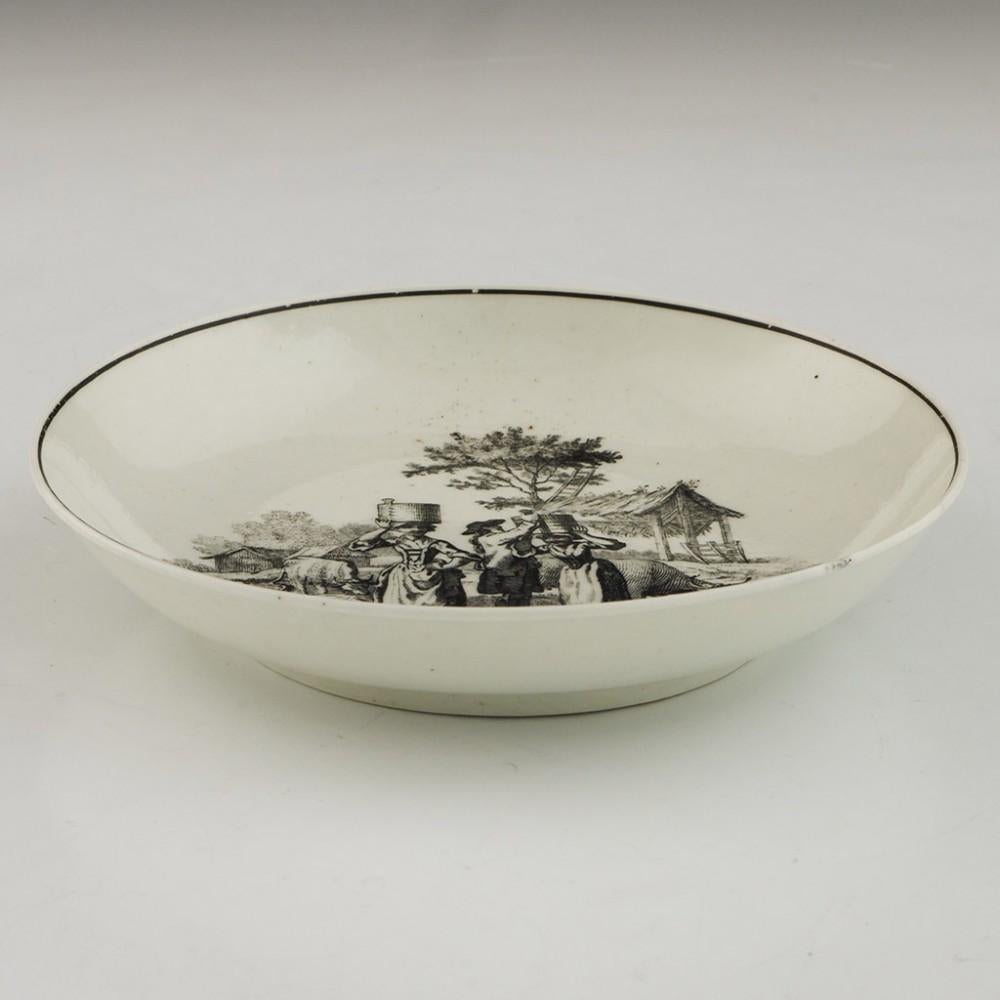 Taza de café y platillo de porcelana Worcester con motivo de lecheras, hacia 1770 Jorge III en venta