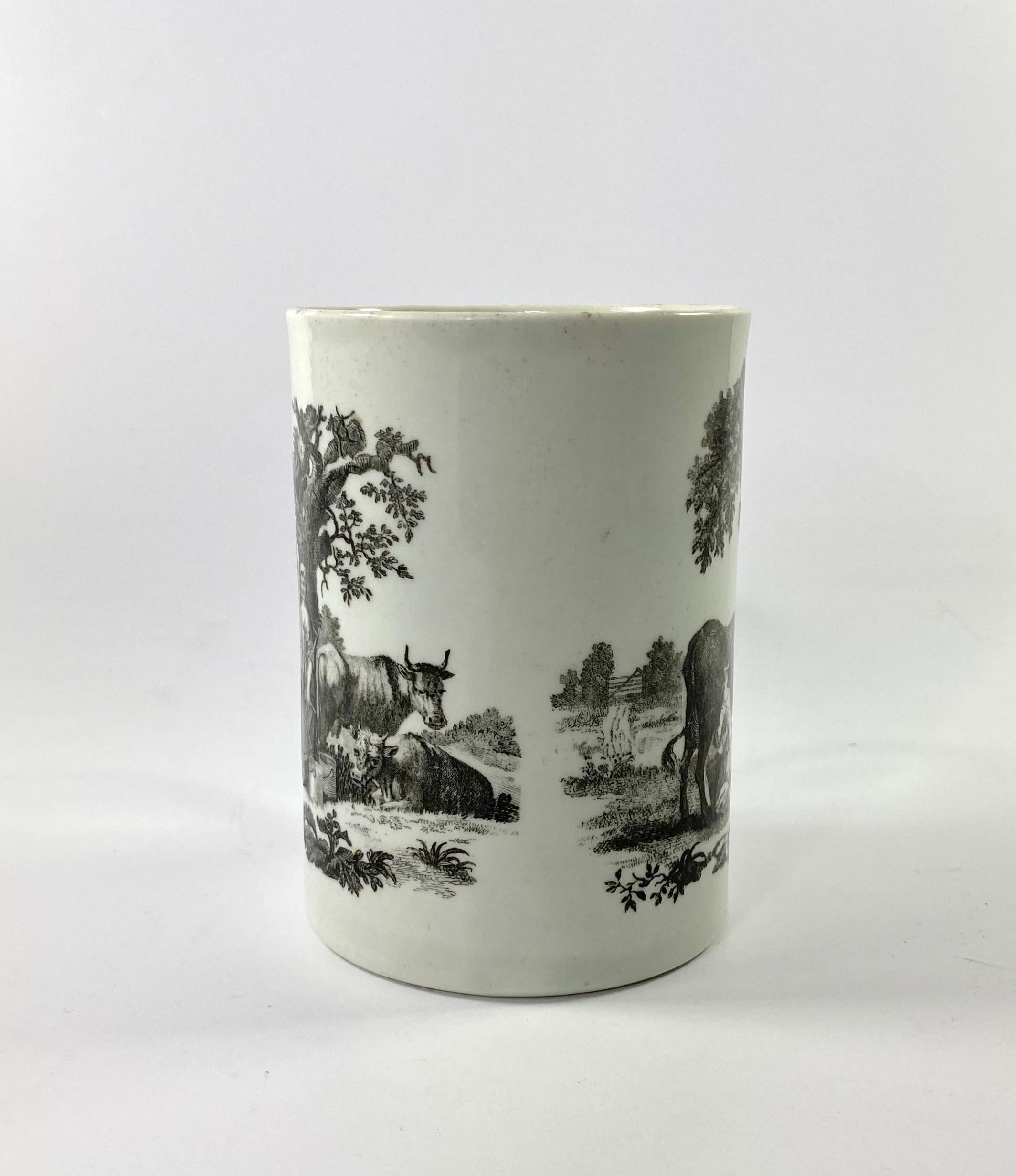 Fine Worcester porcelain mug, c. 1765. Printed with engravings by Robert Hancock; to one side, with ‘Rural Lovers’, a boy with a dog, talking with a milkmaid beneath a tree.
The reverse with ‘Milking Scene, No.1’, with the boy leaning against a