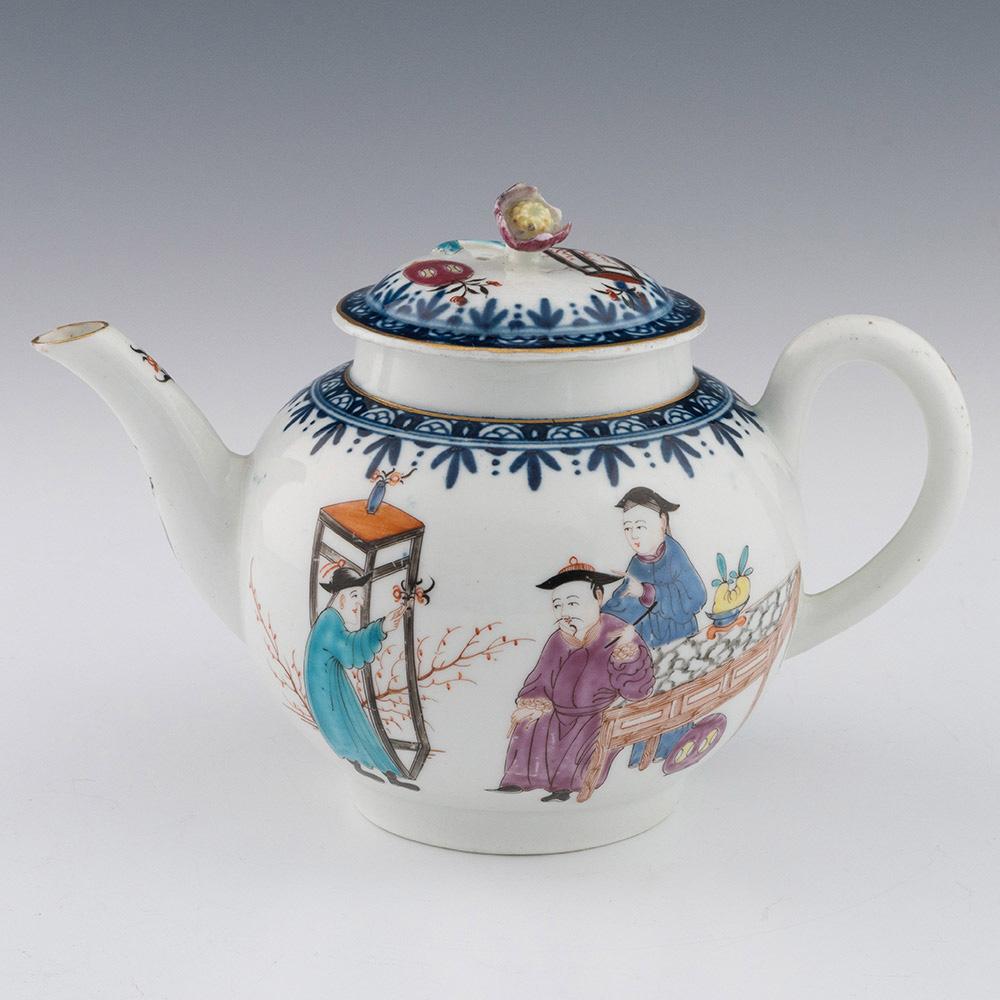 Heading : Worcester porcelain teapot with Chinese figural decoration
Date : c1770
Period : George III
Marks : None
Origin : Worcester, England
Colour : Polychrome
Pattern : Chinese figural scene – two chinese gentlemen sit around a table with a