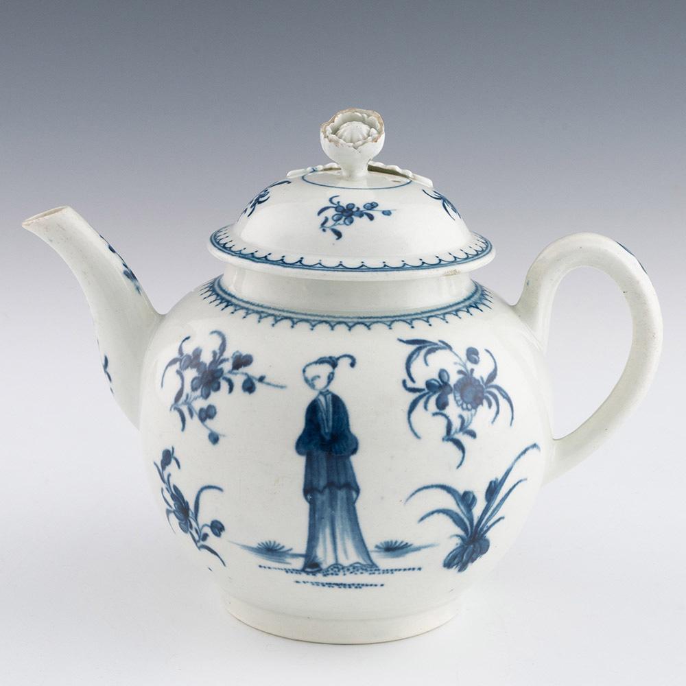 Heading : Worcester porcelain Waiting Chinaman pattern teapot
Date : 1770-1775
Period : George III
Marks : Crescent
Origin : Worcester, England
Colour :Clear
Pattern : Waiting chinaman – I.A.6

Features: Floral finial
Condition : Excellent, other