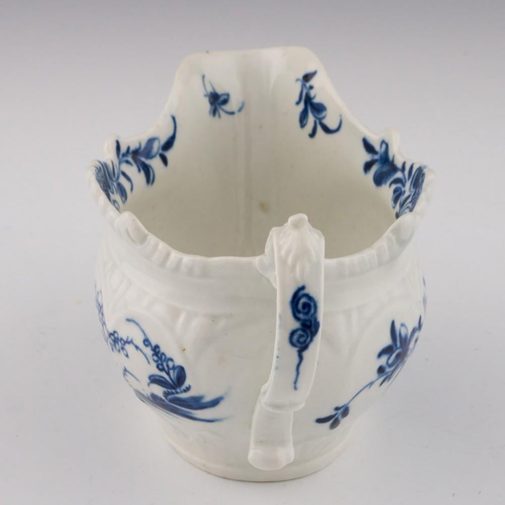 Heading : Worcester Sauce Boat with 'Two Porters' Landscape Pattern.

Date : 1760-80
Period : George III
Marks : Open crescent
Origin : Worcester, England 
Pattern : Two Porter Landscape - Variant 1 as catalogued below
Colour : Underglaze