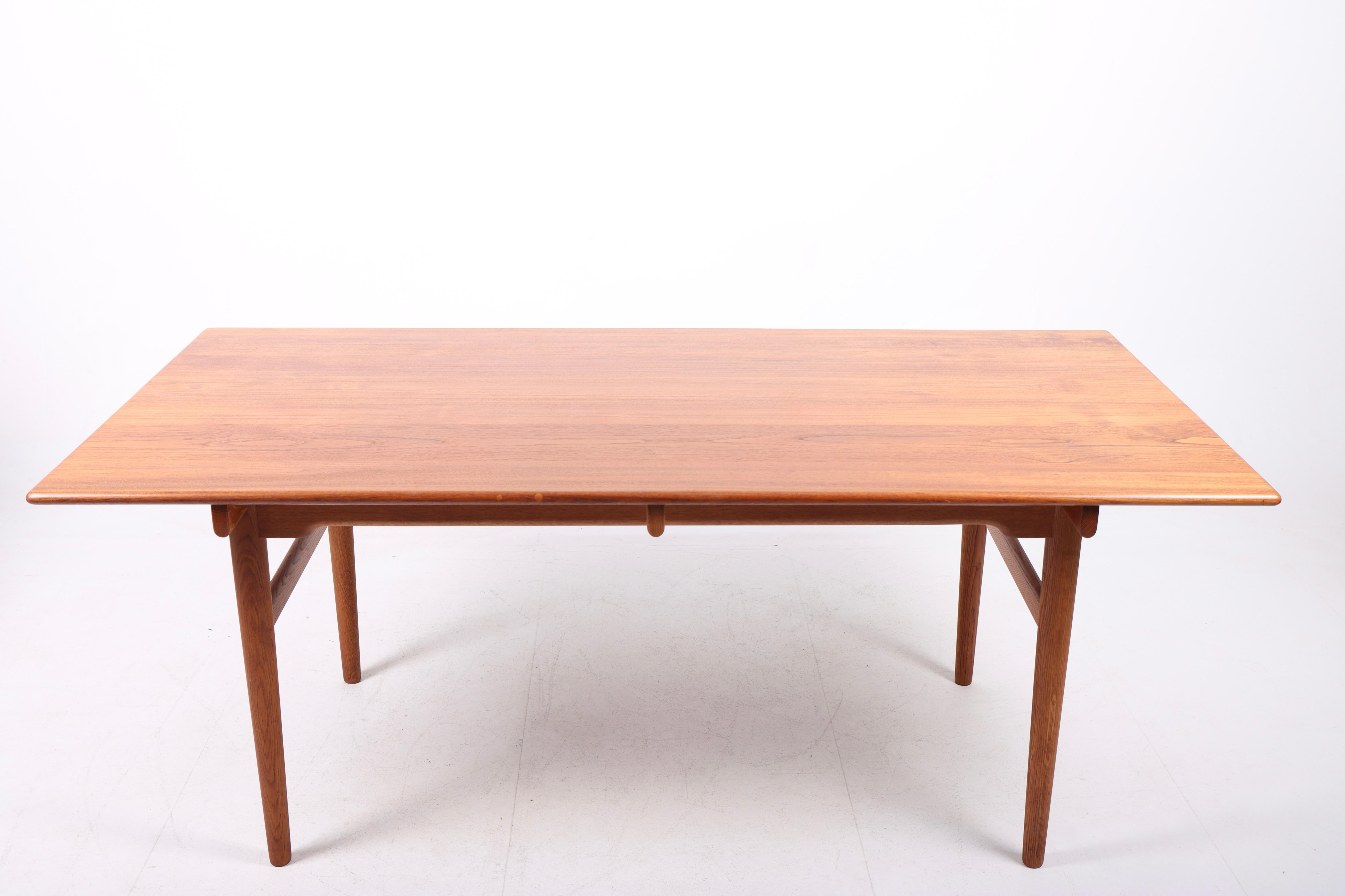 Work table in solid teak designed by Maa. Hans J. Wegner for Andreas Tuck cabinetmakers, Denmark. Great original condition.