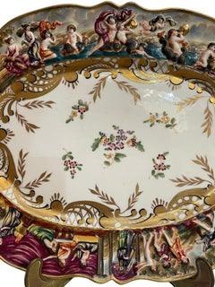 Worked and decorated ceramic plate, Capodimonte, 19th-20th century