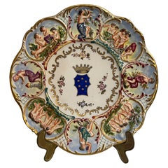 Worked and decorated ceramic plate, Capodimonte, 19th-20th century