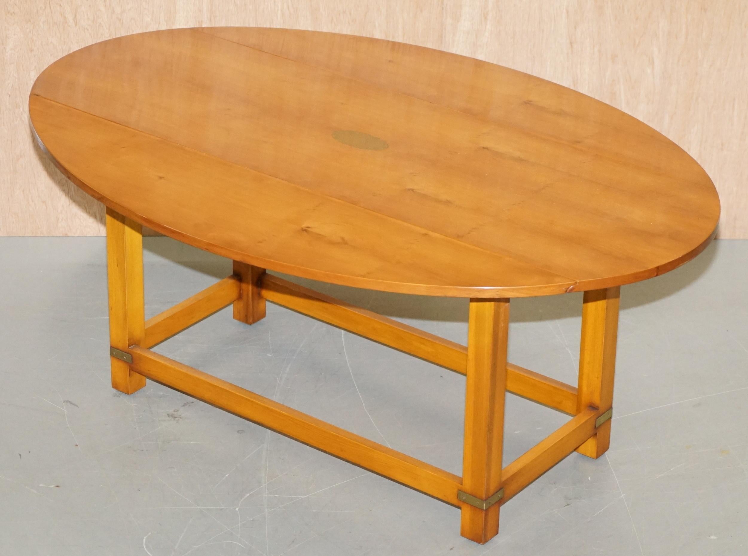 We are delighted to offer for sale this brand new handmade in England by Bevan Funnell, Burr Yew wood extending Military Campaign oval coffee table

This is a lovely and well-made piece by the genius’s at Bevan Funnell, the timber is burr yew wood