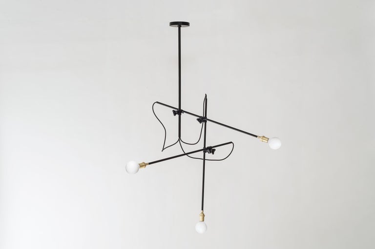 The Workstead chandelier fuses the concept of the chandelier with a keen understanding of function and flexibility. The same standard pieces can be reconfigured in countless ways; as a horizontal fixture that hangs only 30