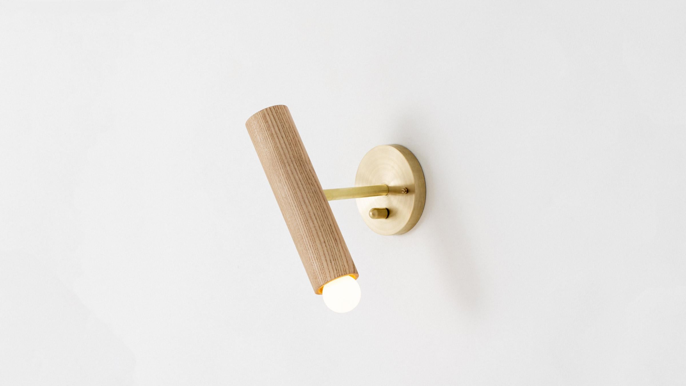 The lodge extension sconce projects the wooden lodge cylinder off the wall. An incorporated swivel creates comfortable bedside reading or task lighting. Made in the USA. UL Listed. Damp rated upon request.