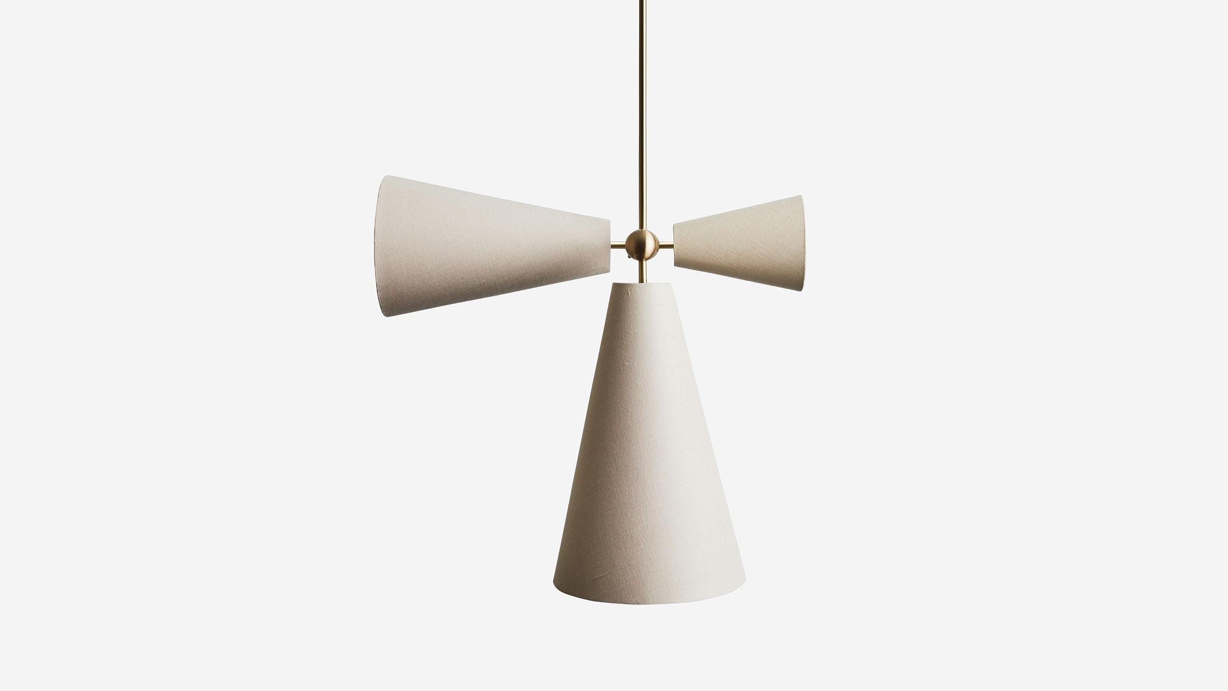 Pendolo IV balances two sets of opposing cone forms to create a dynamic expression of movement in multiple axes. Casting directional light onto 4 distinct zones, Pendolo IV embodies the collection at-large through its perspectival play on the cone