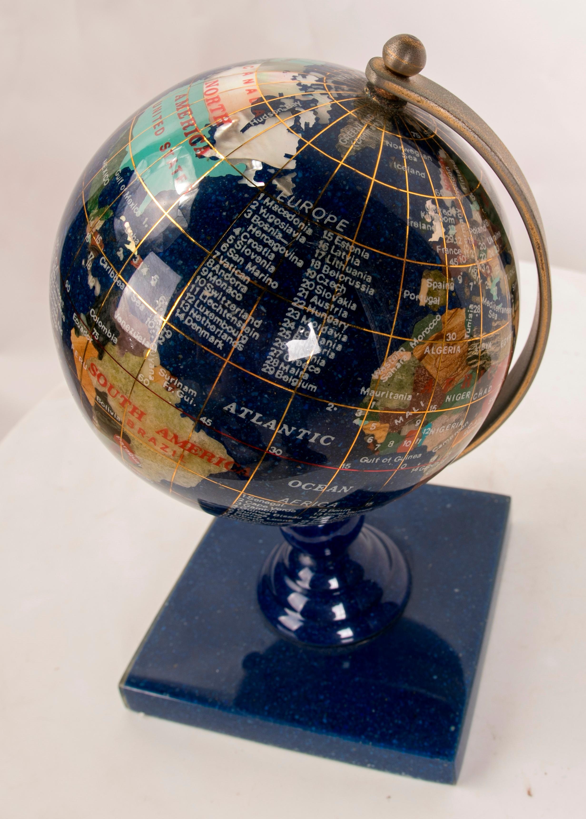 World Ball Sculpture Made of Hand-Carved Stones on a Base For Sale 9