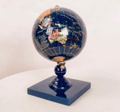 World Ball Sculpture Made of Hand-Carved Stones on a Base