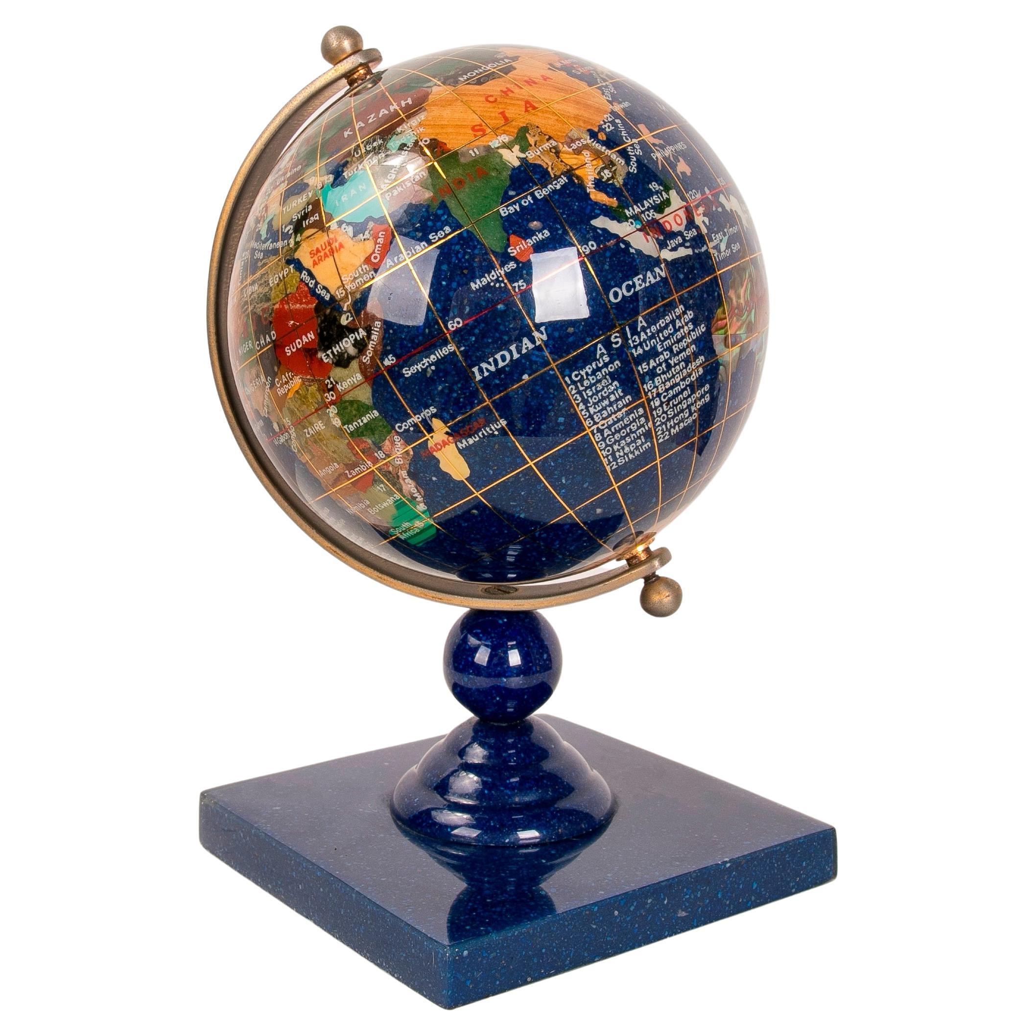 World Ball Sculpture Made of Hand-Carved Stones on a Base For Sale