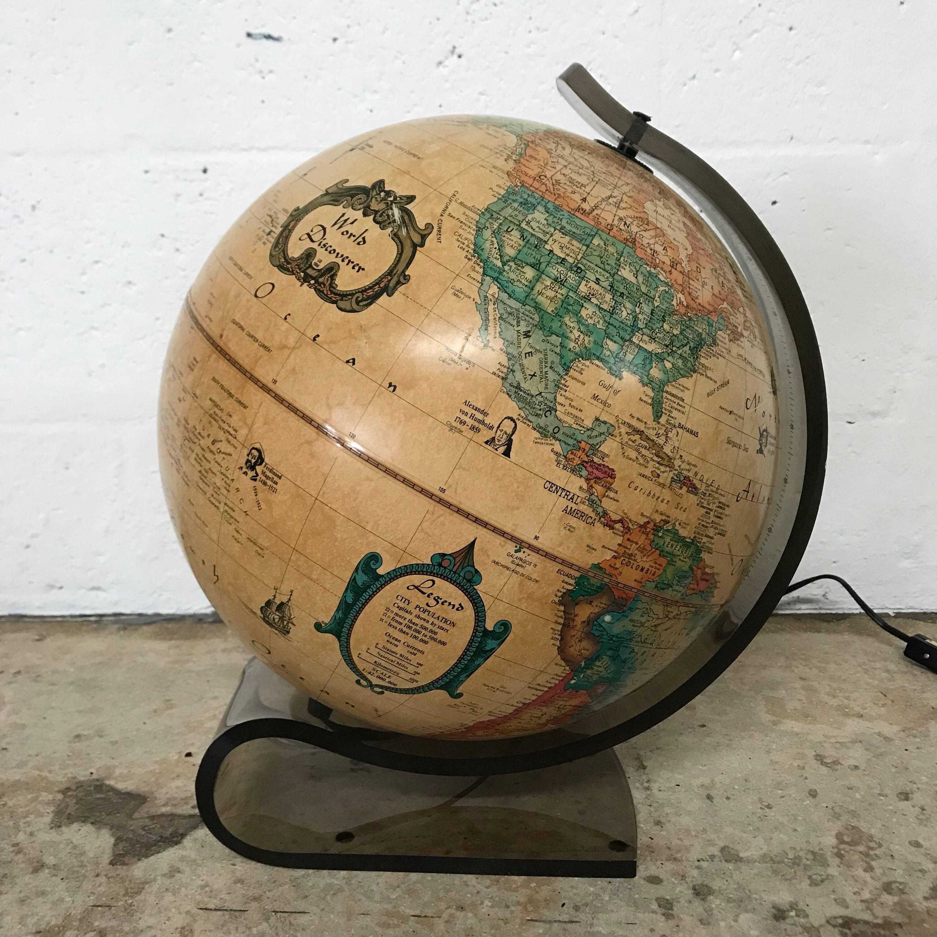 Light up globe lamp on a smoked Lucite stand by, World Discovery, Great Britain, 1986.