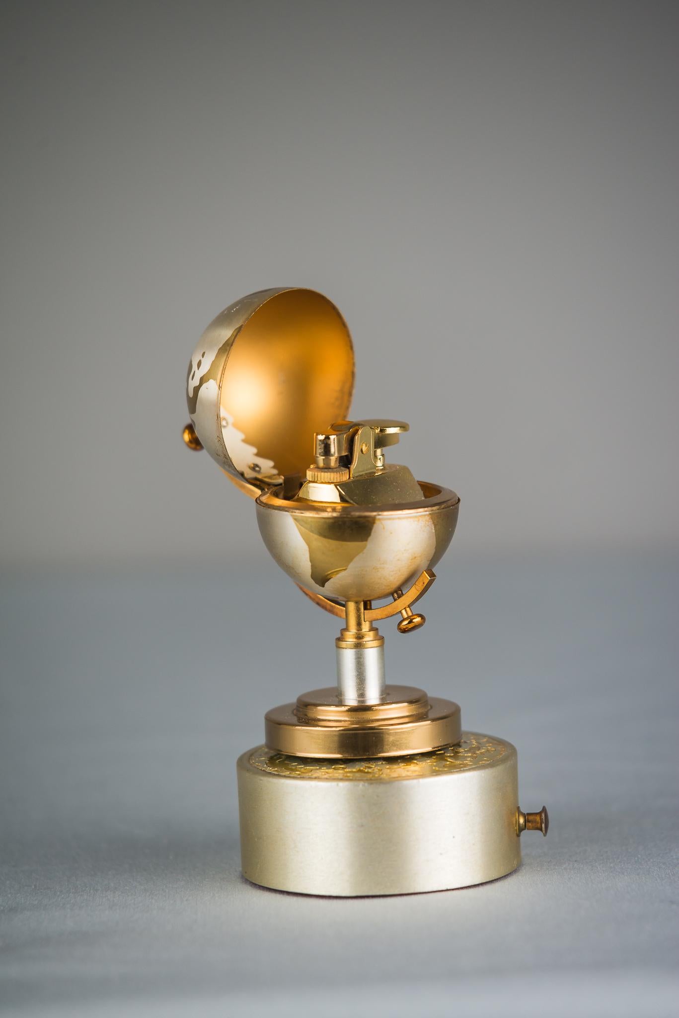 German World Globe Lighter with Music, by Europa, circa 1950s