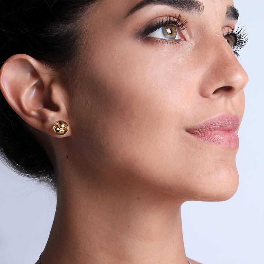 Show off your passion for travel and adventure with these elegant World Small Earrings. Featuring 24k gold plated brass, they're elegant yet simple, perfectly complementing both day and night outfits. Whether you buy it for yourself or your favorite